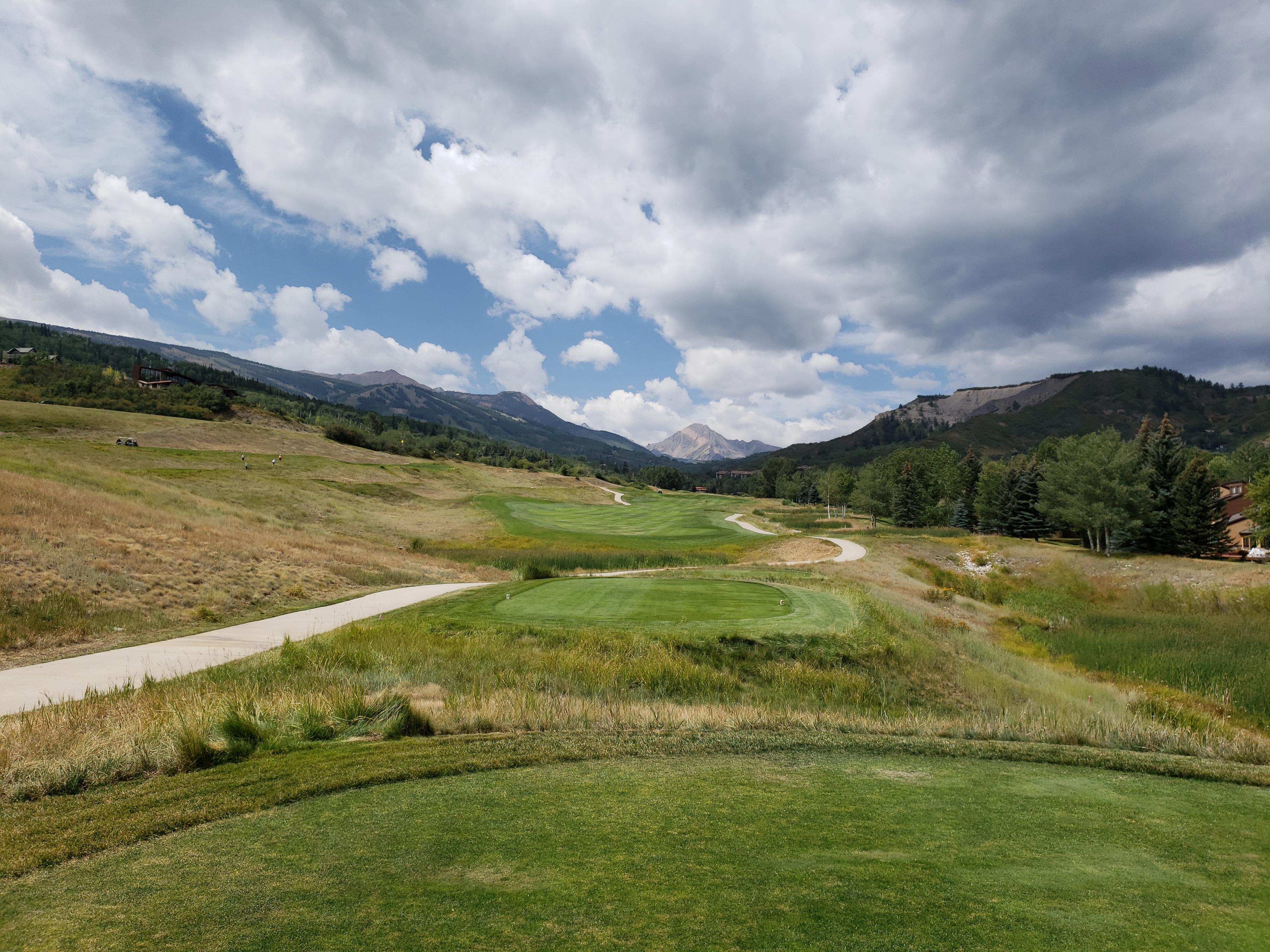 Sneaking in a round on the honeymoon. Snowmass golf club, hole 11, snowmass peak straight ahead