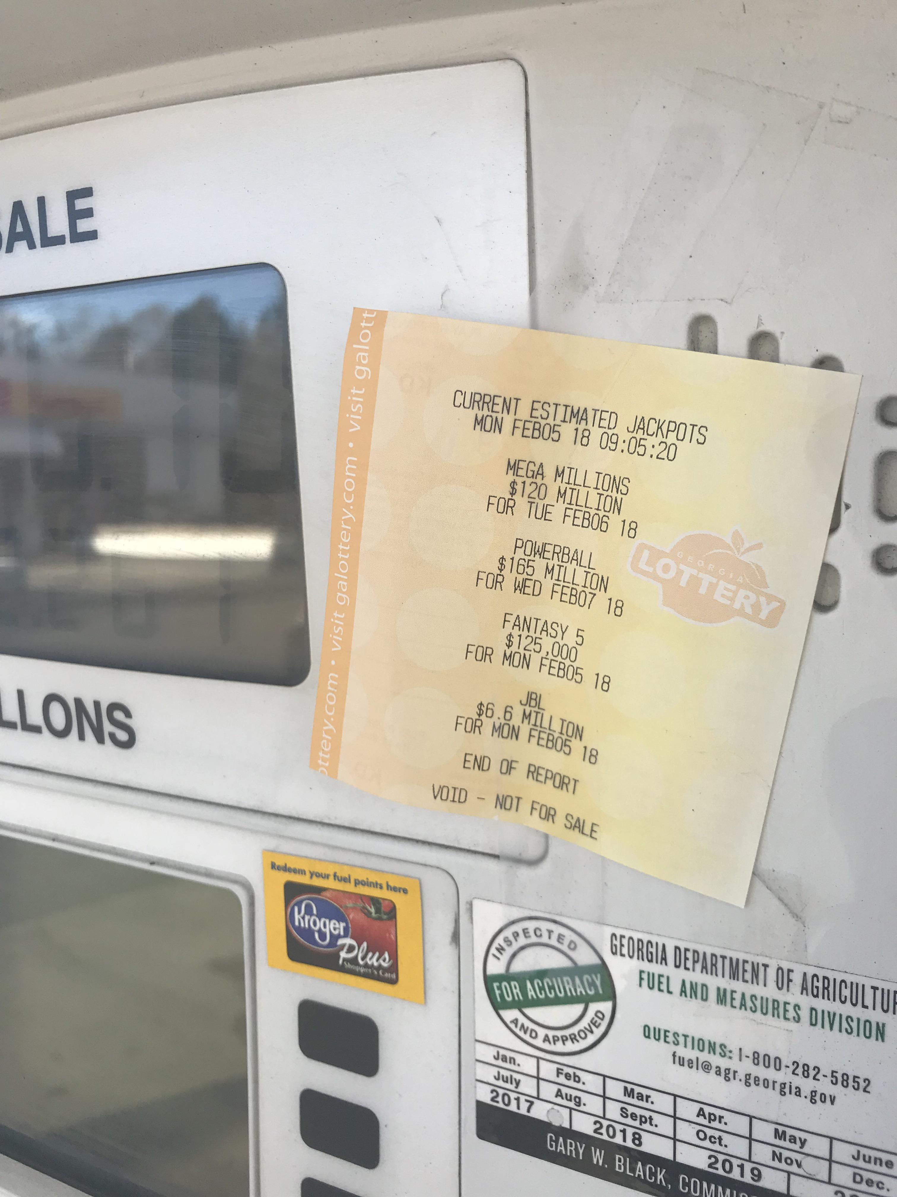 This gas station tapes the lottery jackpots to their pumps to entice