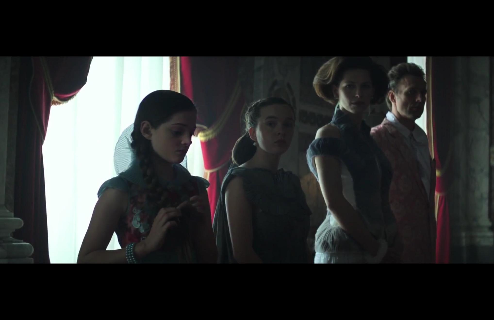 Who are the women next to president Snow's Granddaughter? r/Hungergames