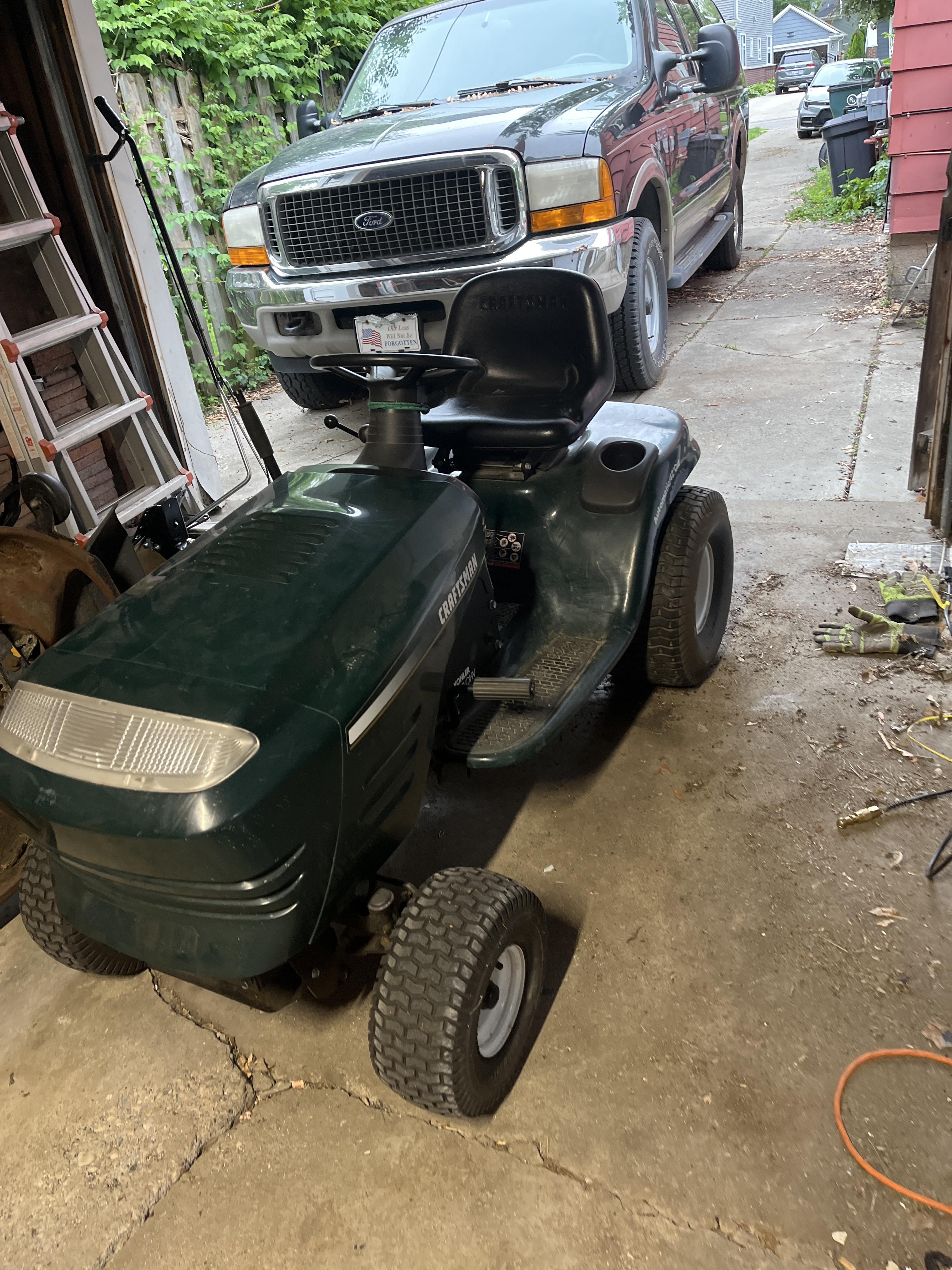 Just got this mower for free. The guy said the wheels locked up while