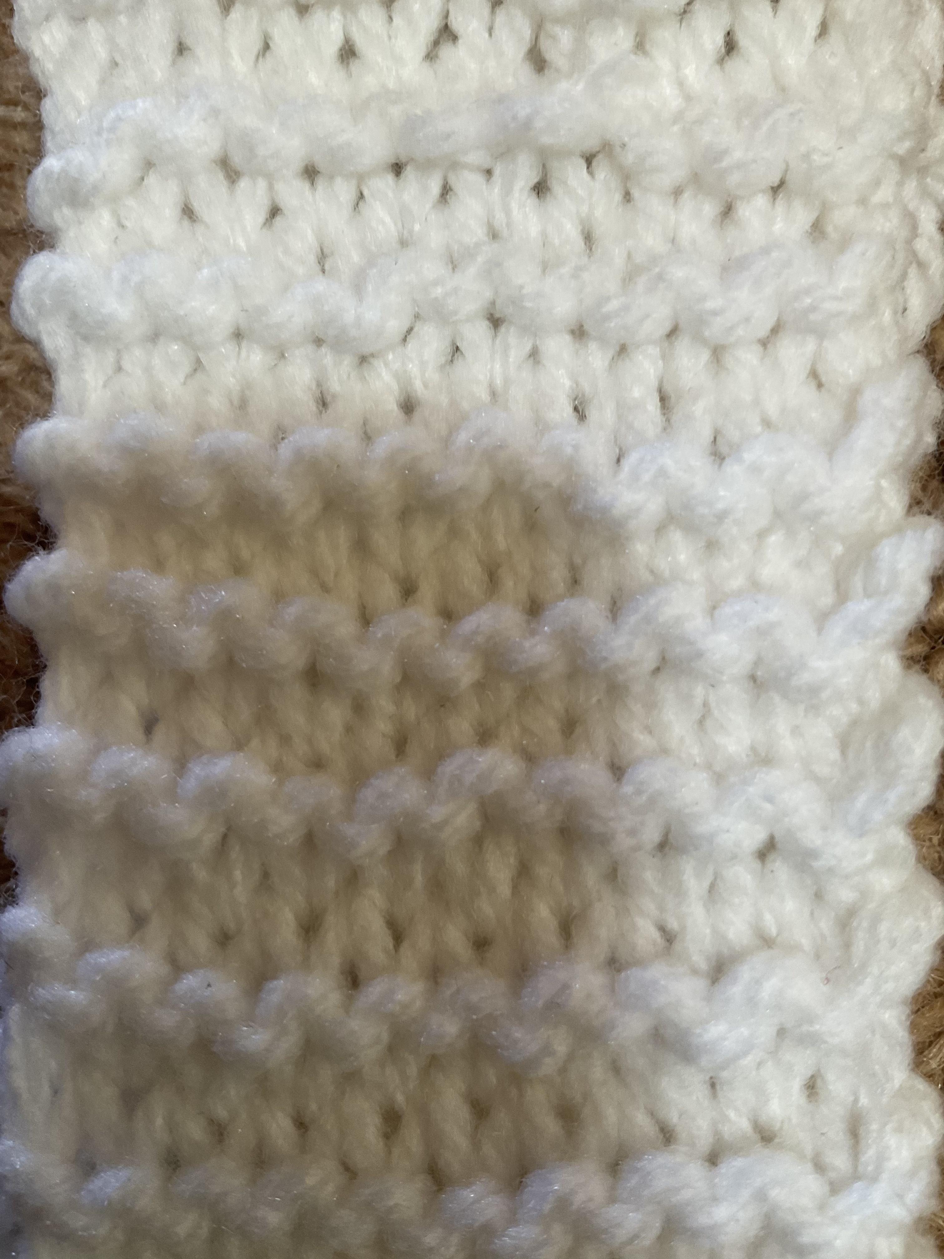 Why do my stitches have rows of knit stitches in the middle