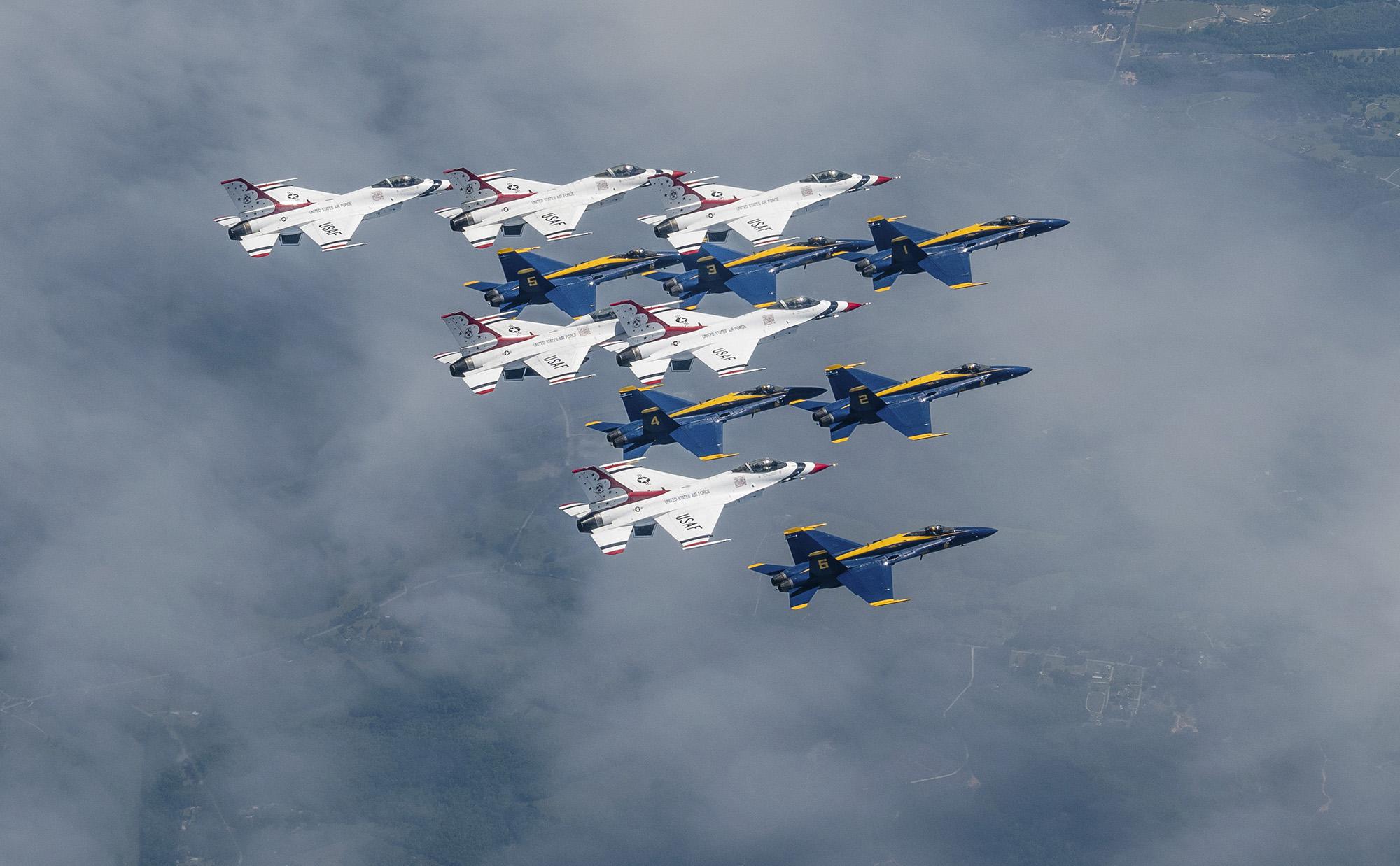 Thunderbirds and Blue Angels in formation flights over New York City on