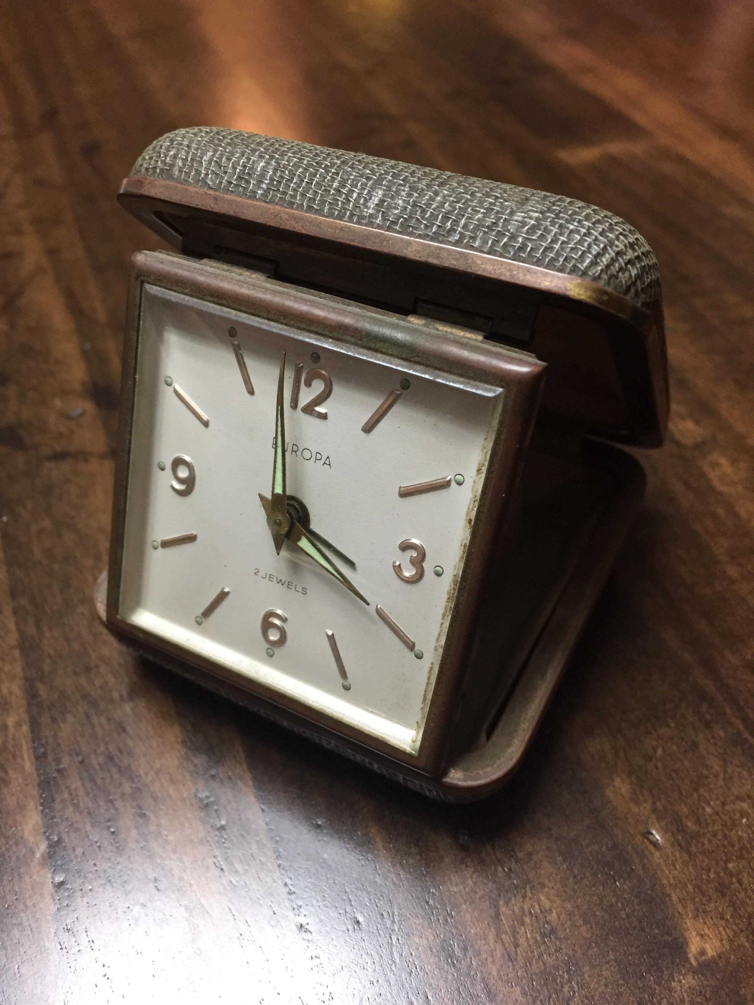 Bought an antique clock, face reads “EUROPA” and “2 JEWELS”, inside