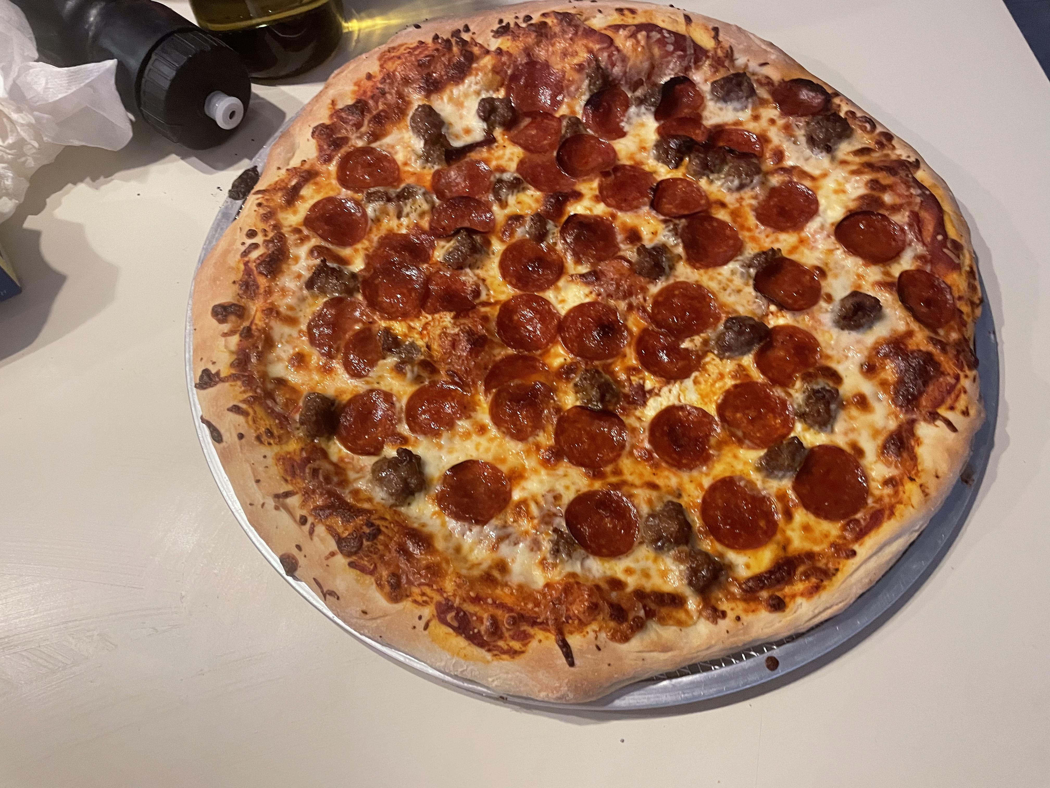 Pepperoni, Sausage, ricotta and Mozzarella New York Style. r/Pizza