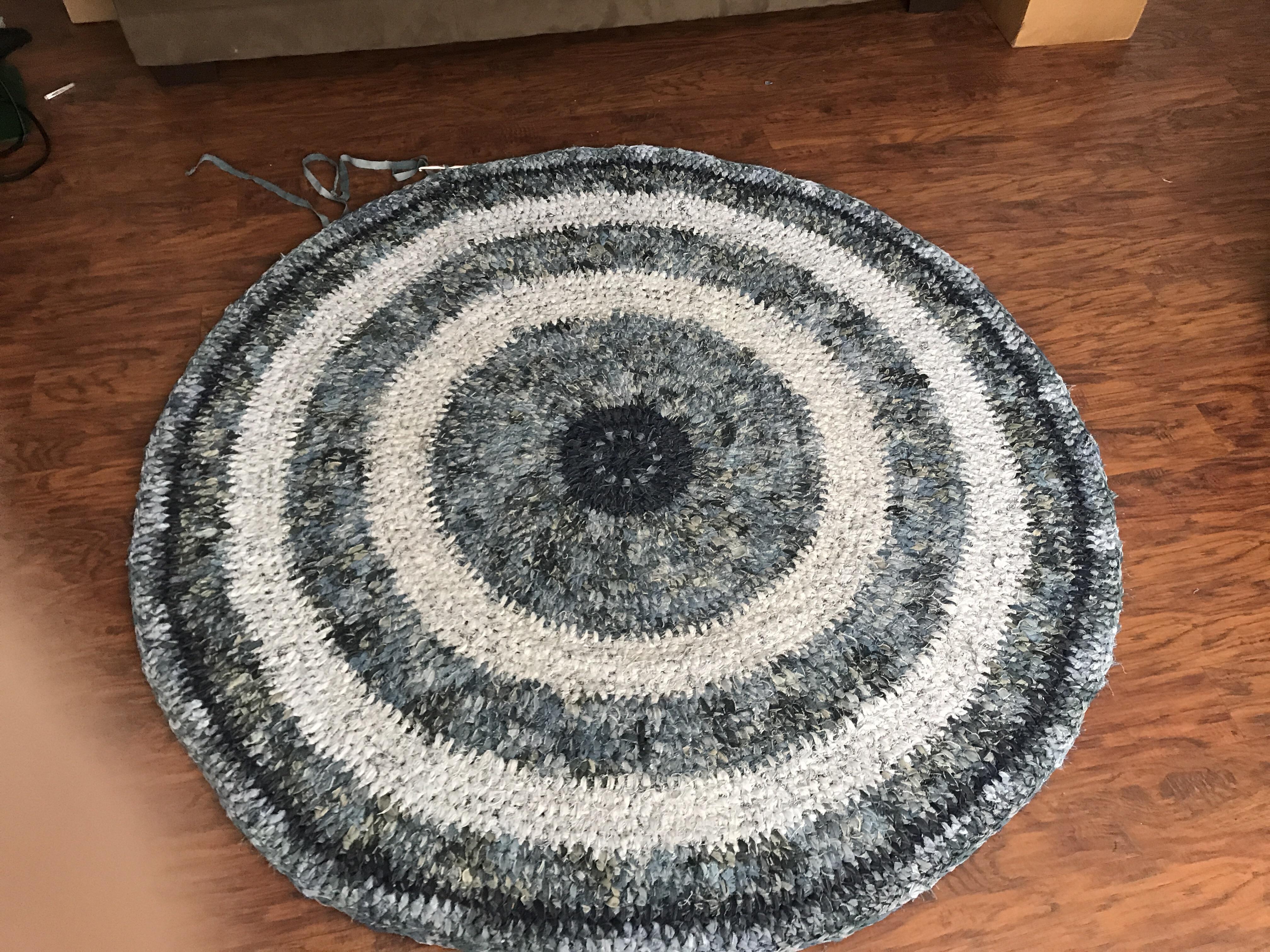 Making a rug out of old jeans and curtains. Have I been looking at it