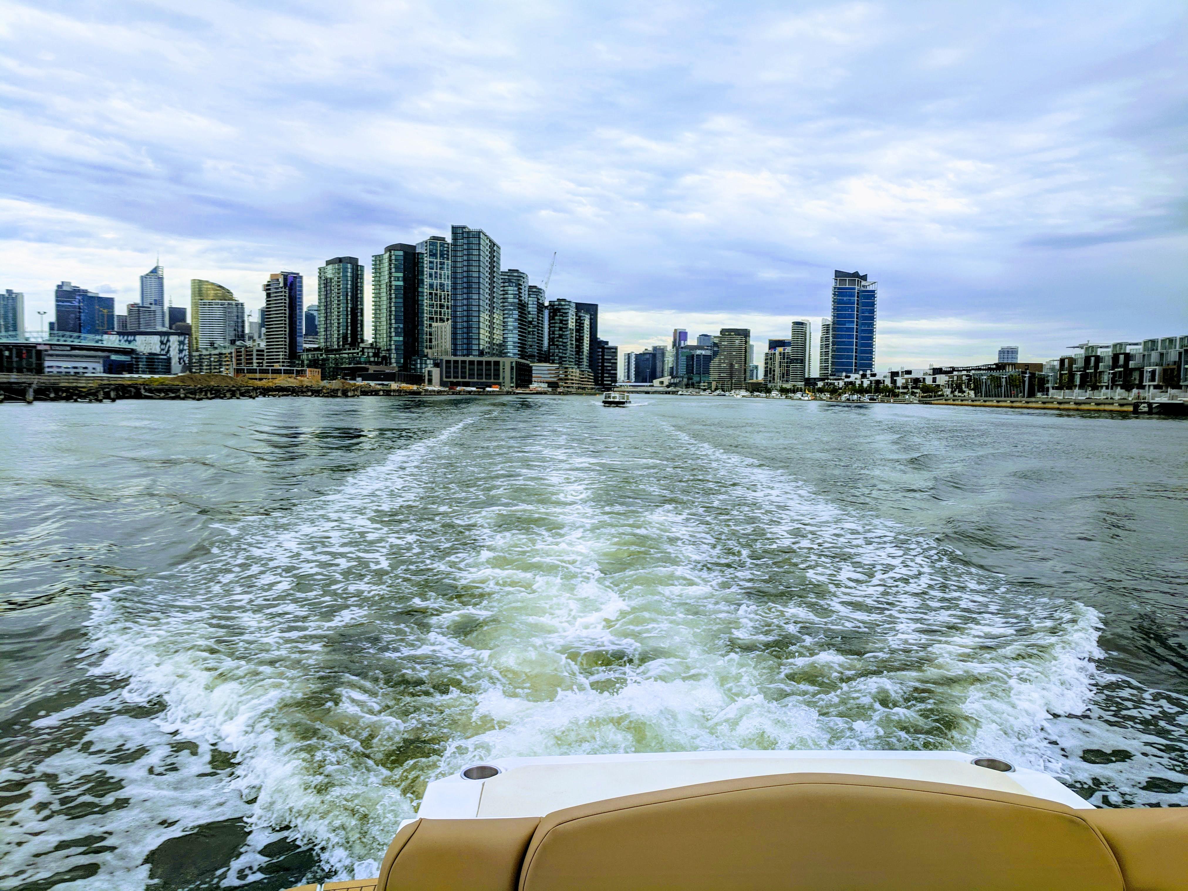 Melbourne from the Yarra River heading to Port Phillip Bay. r/melbourne