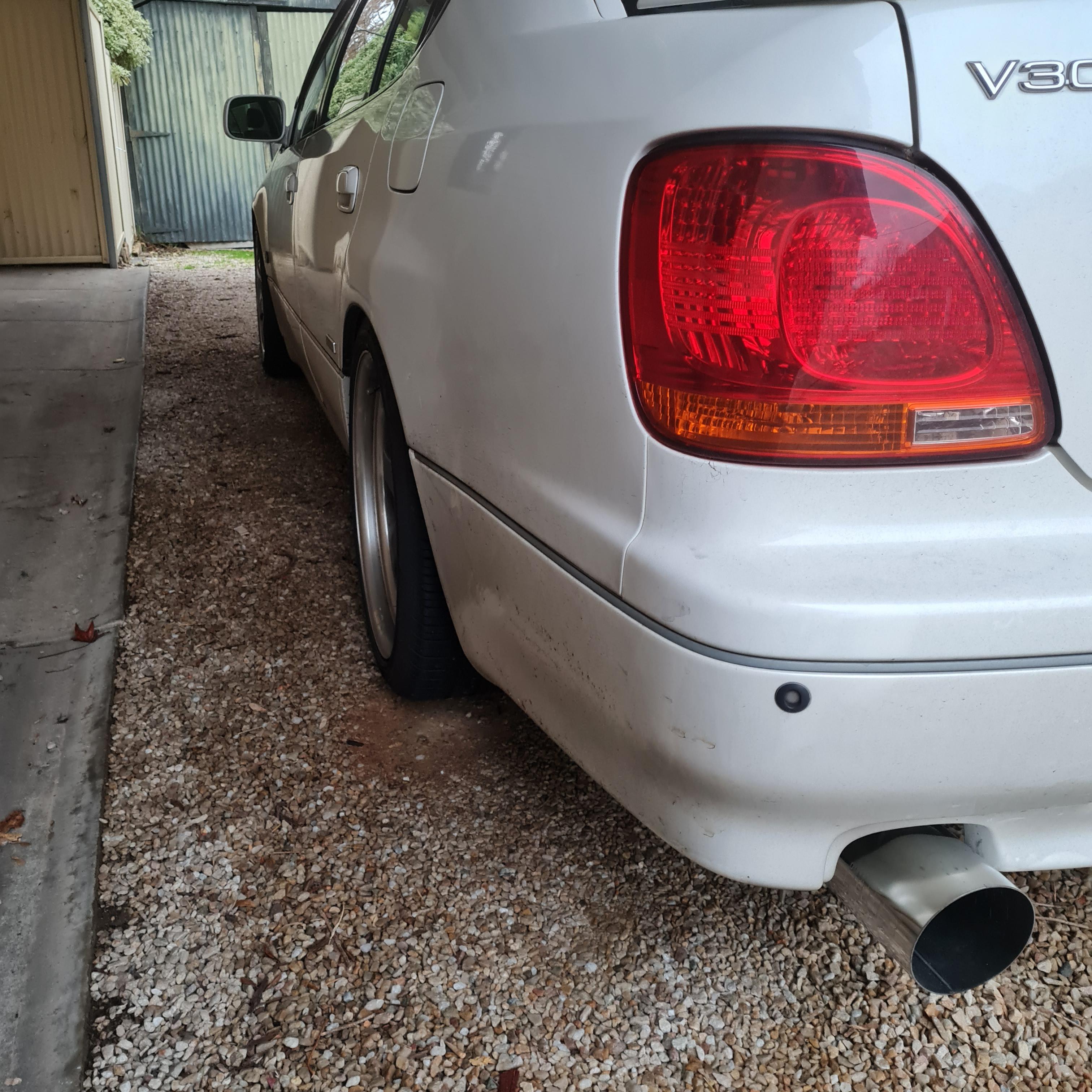 Mechanic installed coilovers and now my flush fitment looks tucked. How