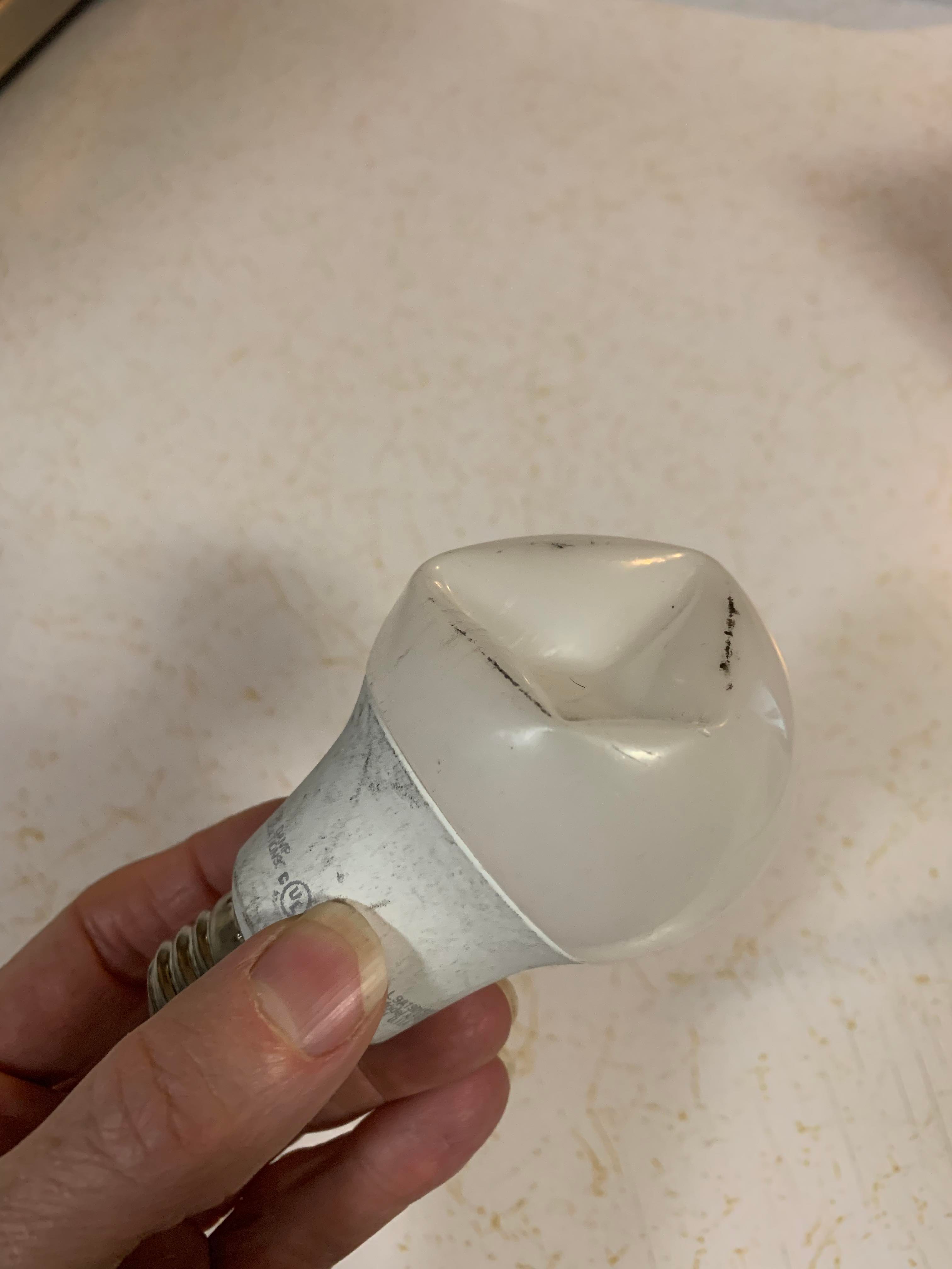 Overhead light started flickering. Took the bulb out and this is what