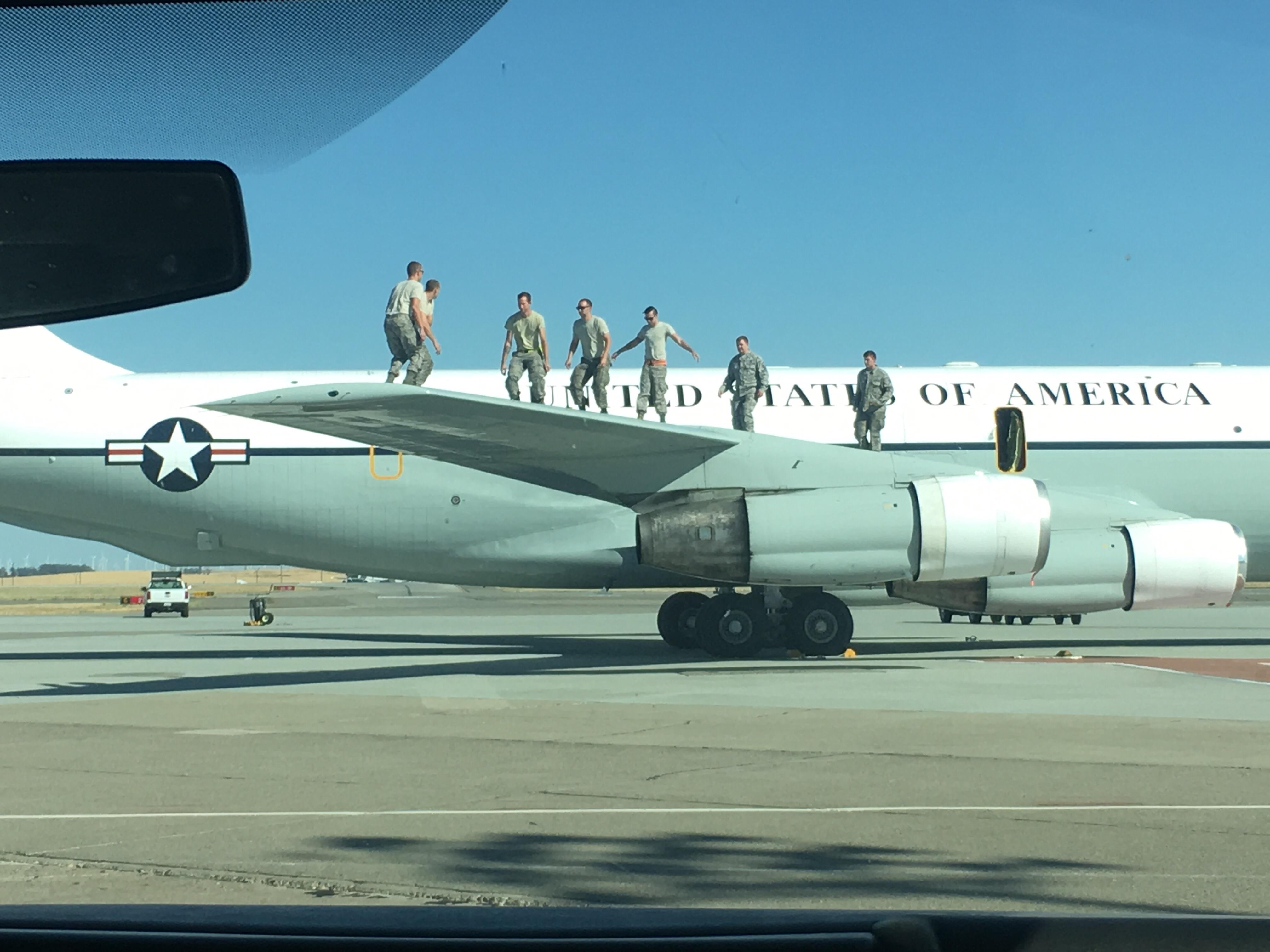 Let's jump on the wing to get the fuel gauge to register... it's safe