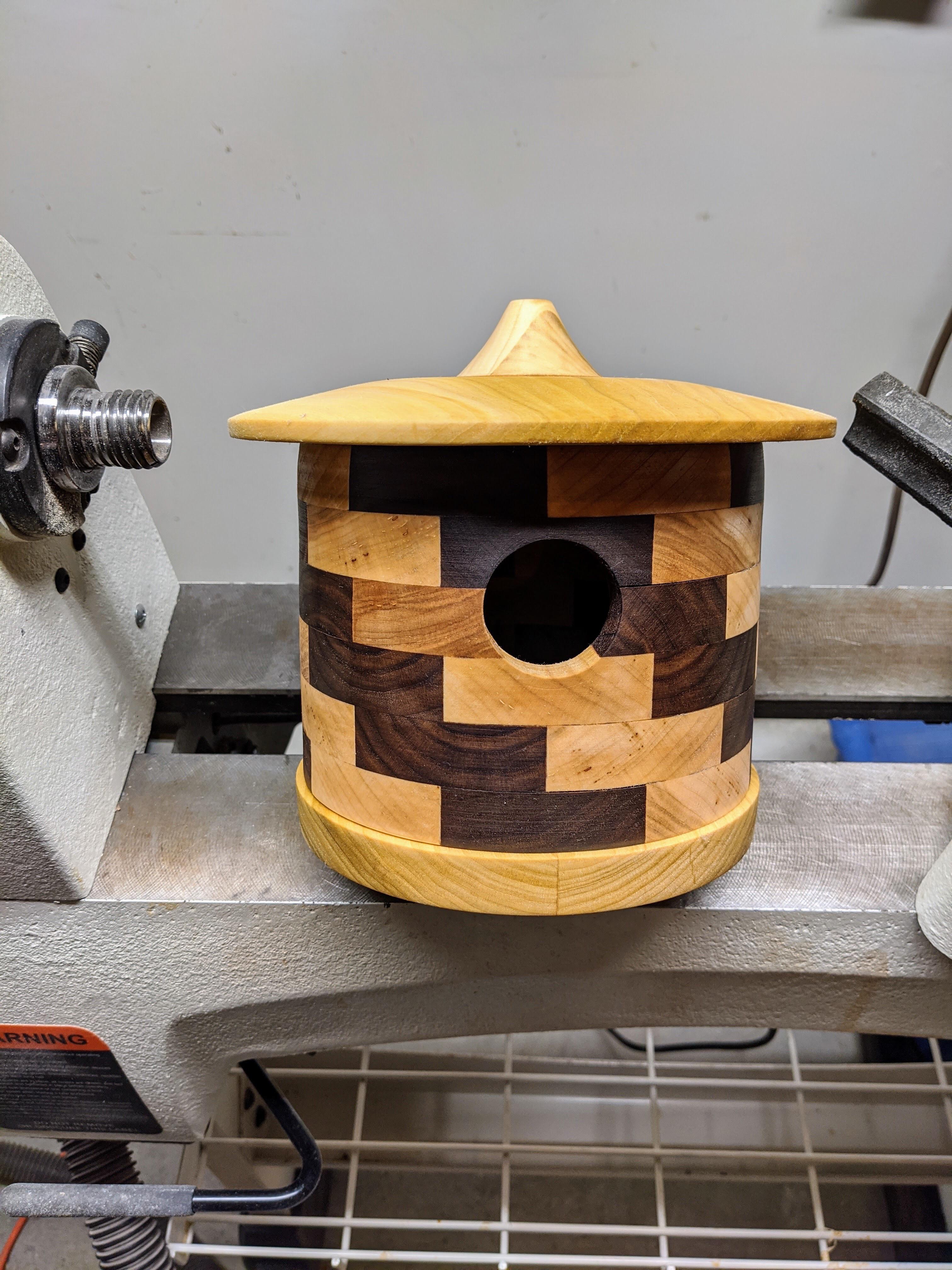 Segmented bird house maple, walnut, poplar r/turning
