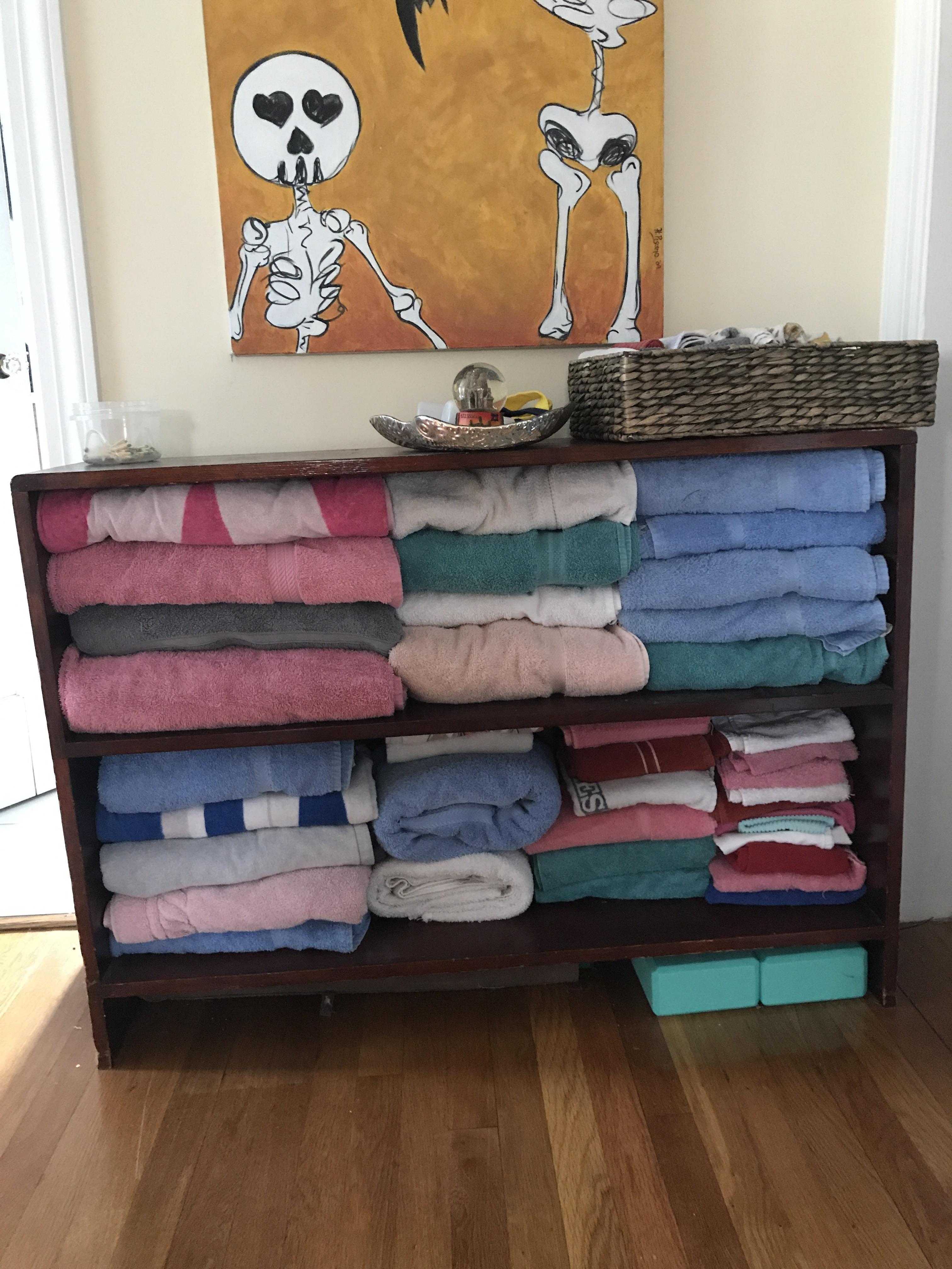 Organized my towel situation! The basket on the top right is washcloths