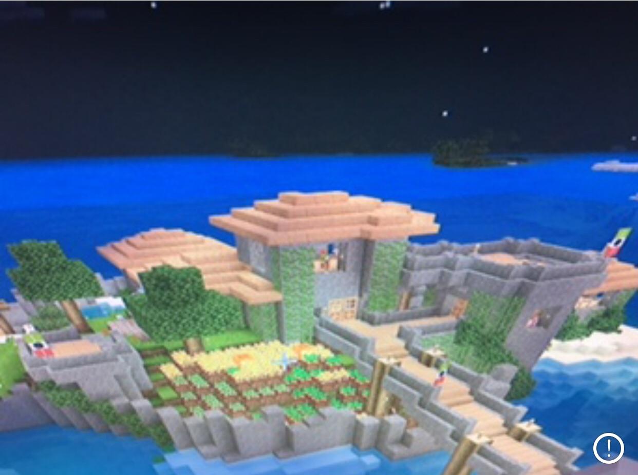 A house I built on a island with a wall around it in my survival world