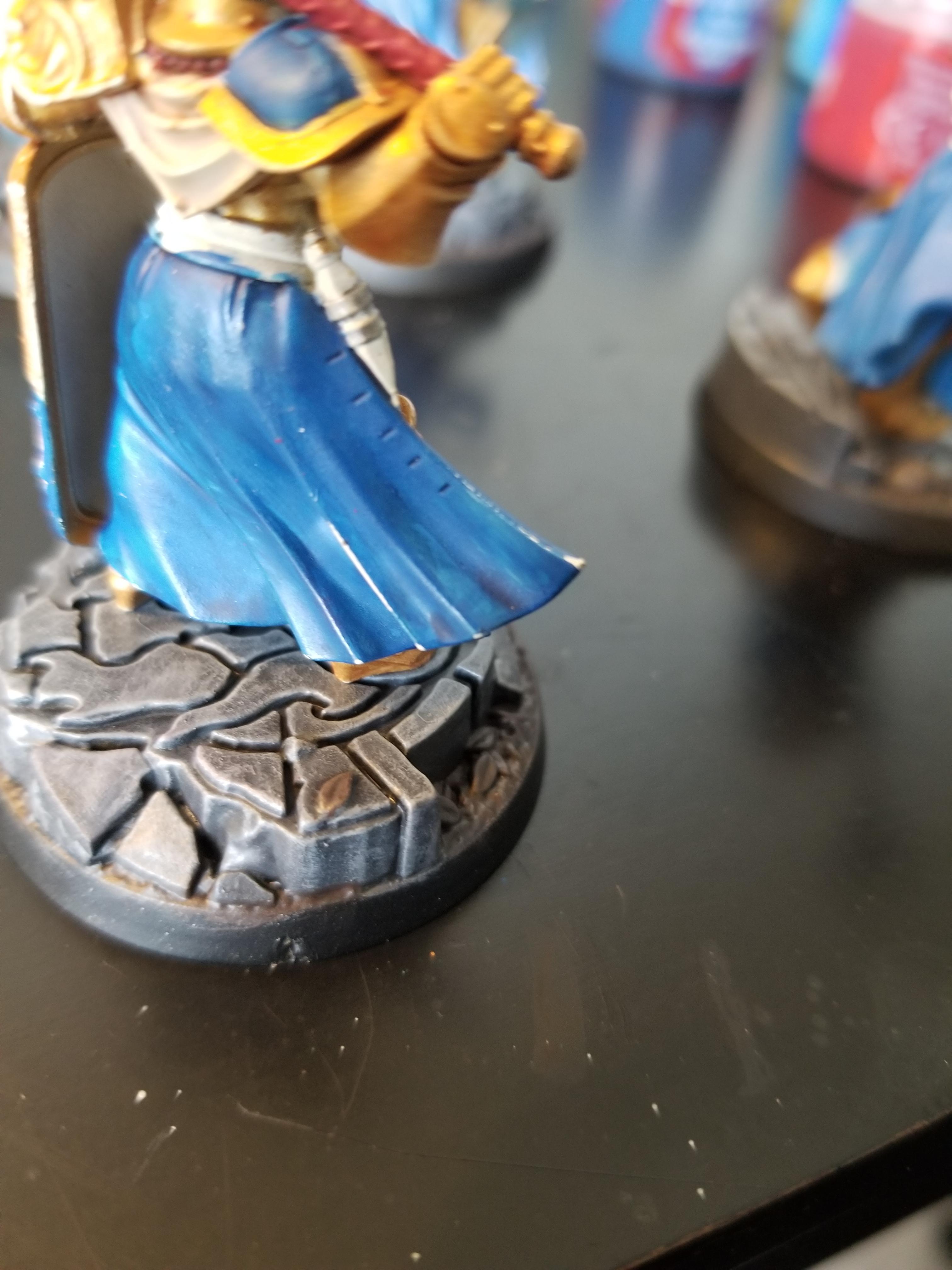I am having issues with the paint coming off the edges of my models