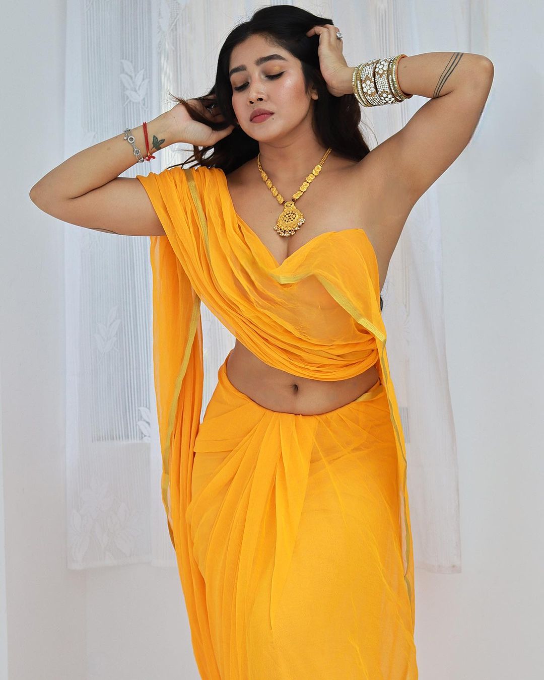 Sofia Ansari in yellow saree : NavelNSFW