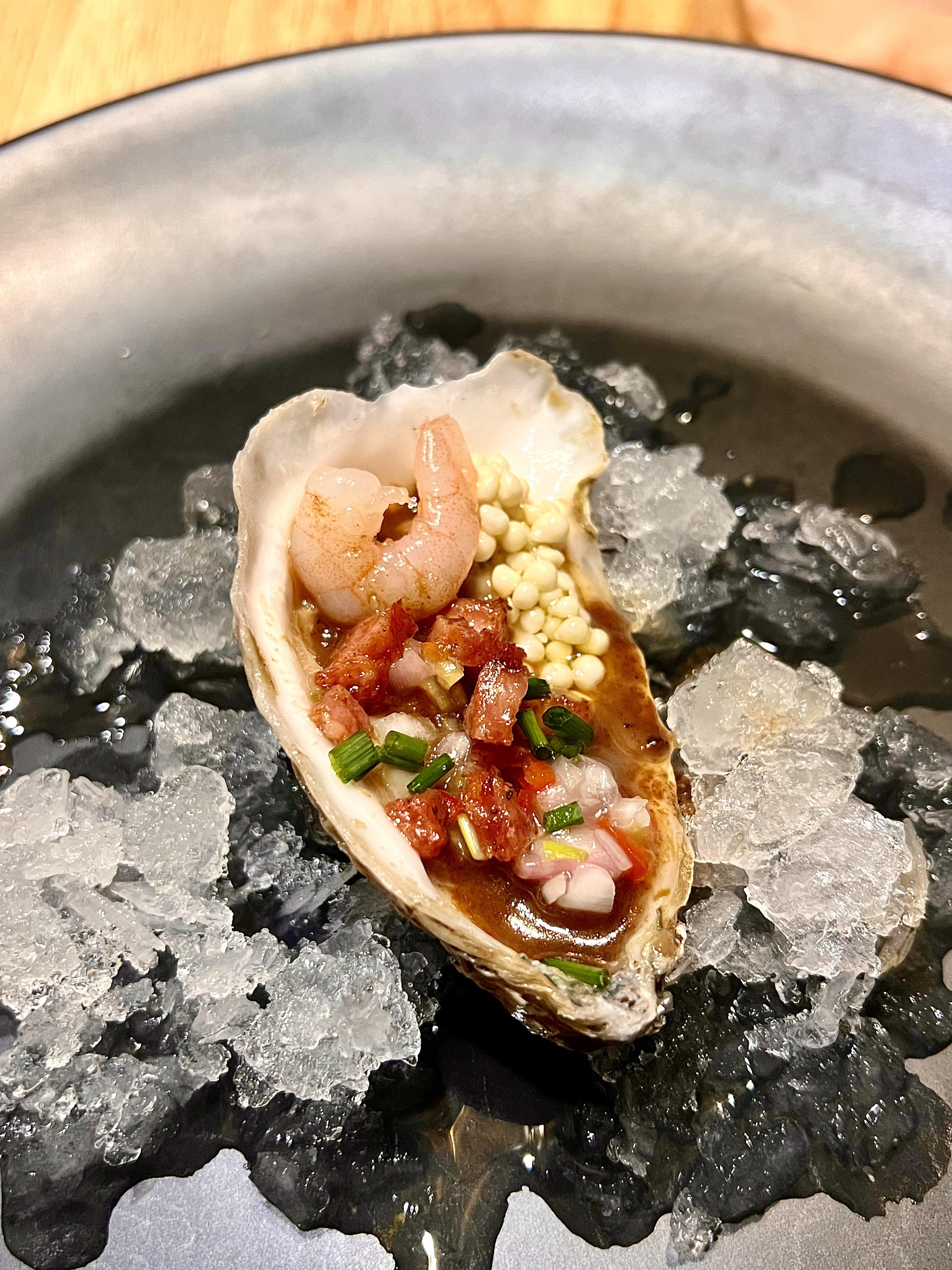 [homemade] Gumbo oyster shooter. Raw oyster, thin roux flavored w/ file