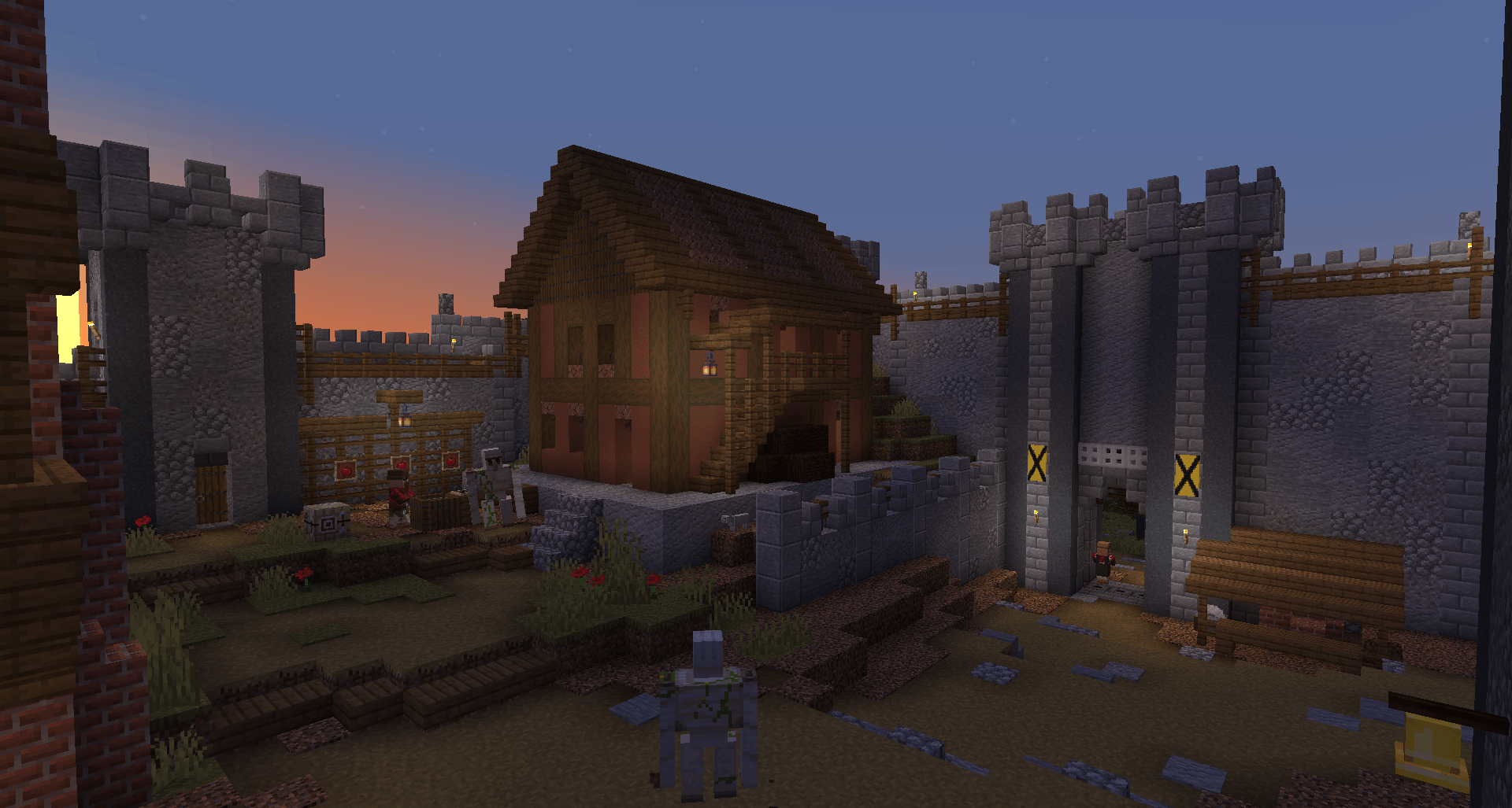 Fletcher's house and a castle gate. The new villagers really make the