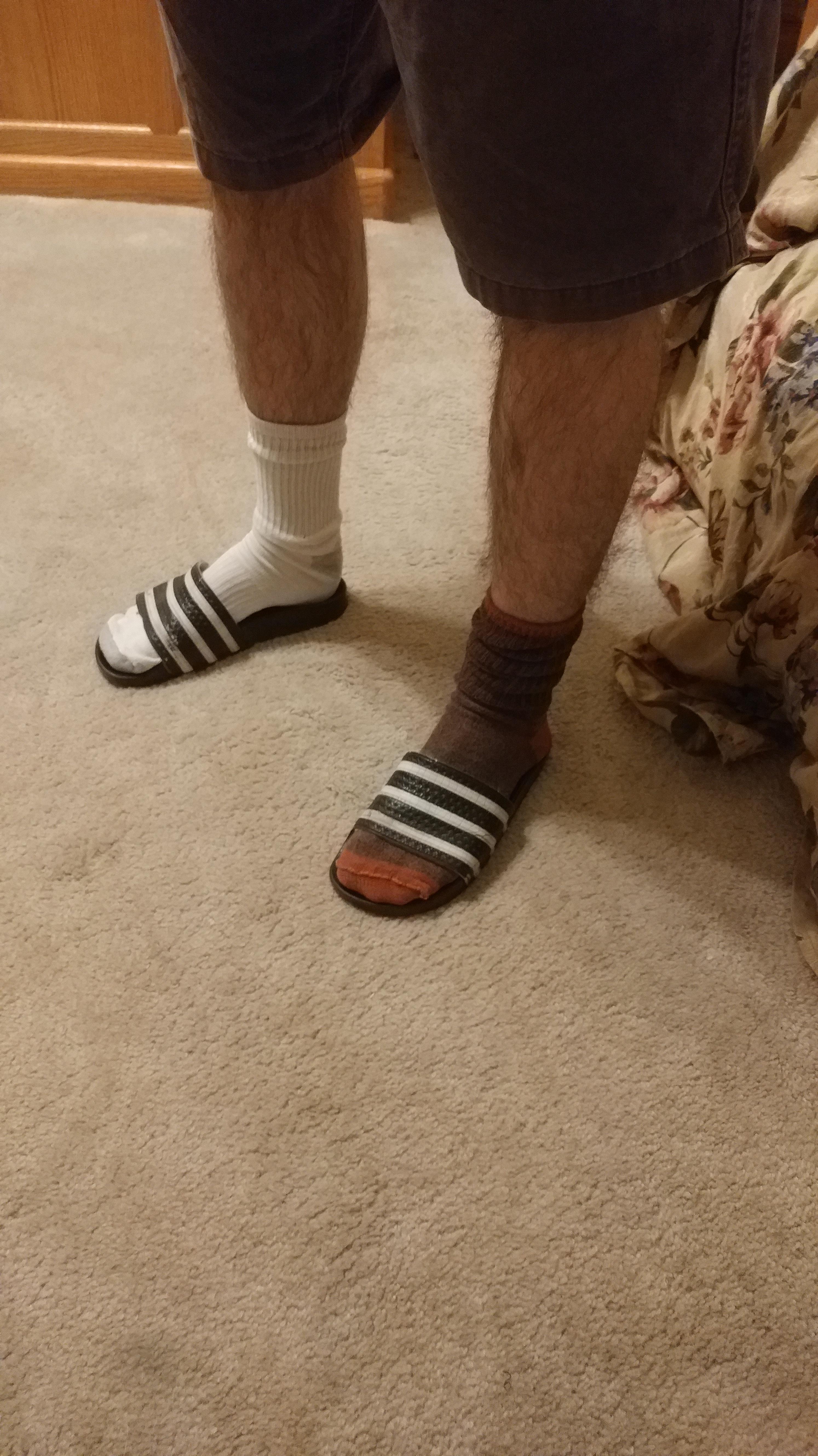 My bro is wearing mismatched socks and slides. r/mildlyinfuriating