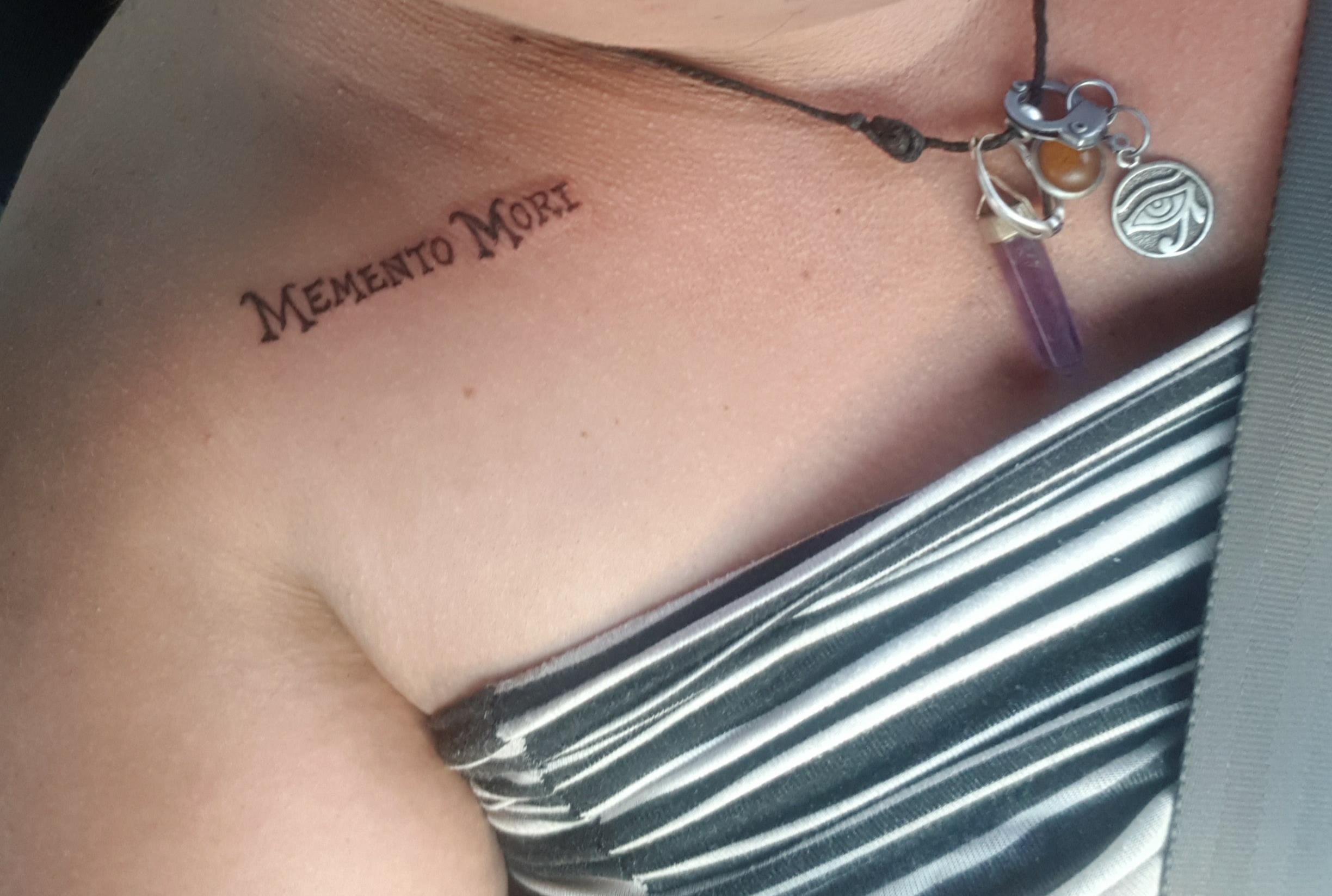 My latest tattoo about death. It's Latin for "remember you must die". I