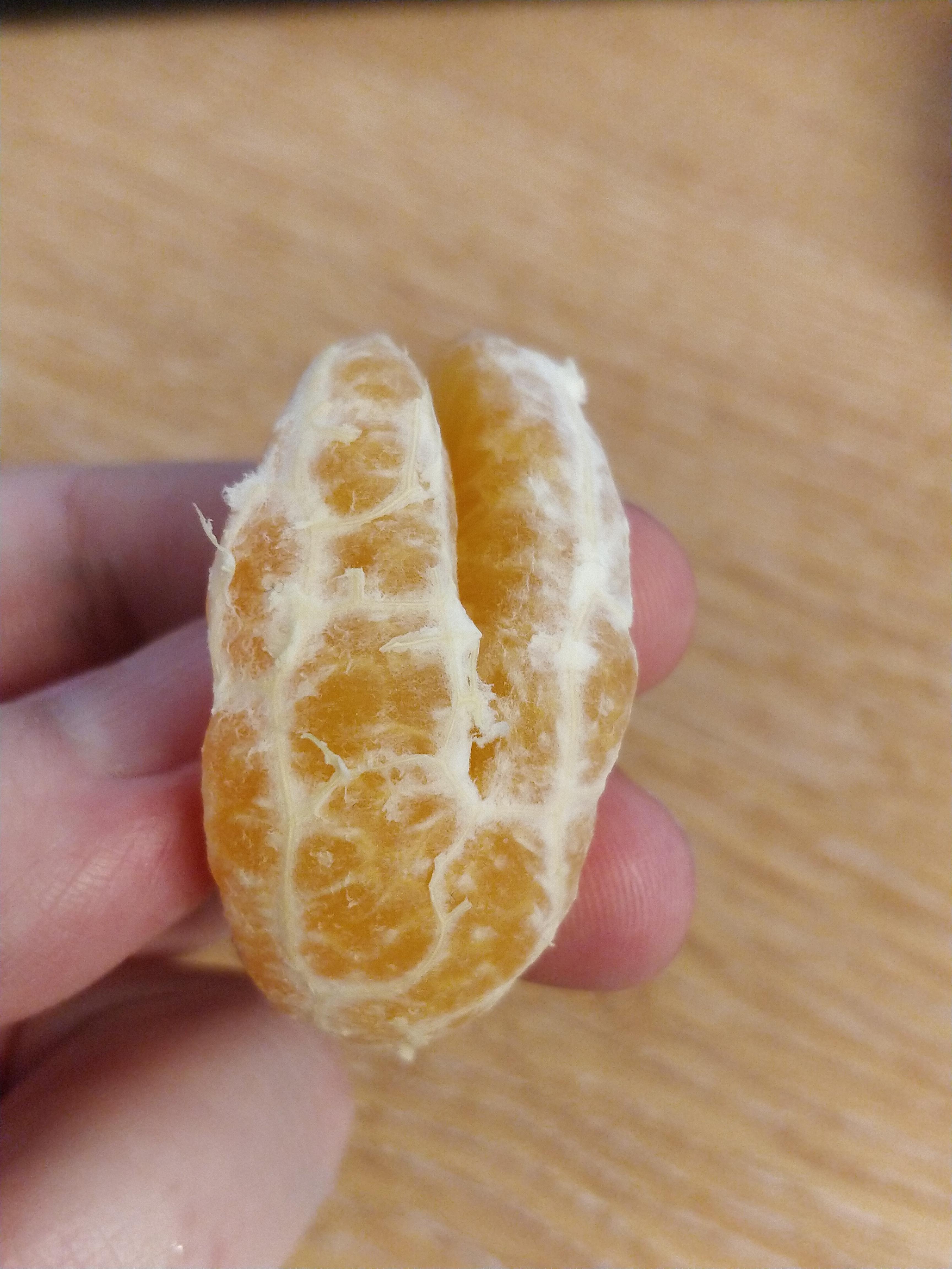 This satsuma segment was trying to split itself in half... r