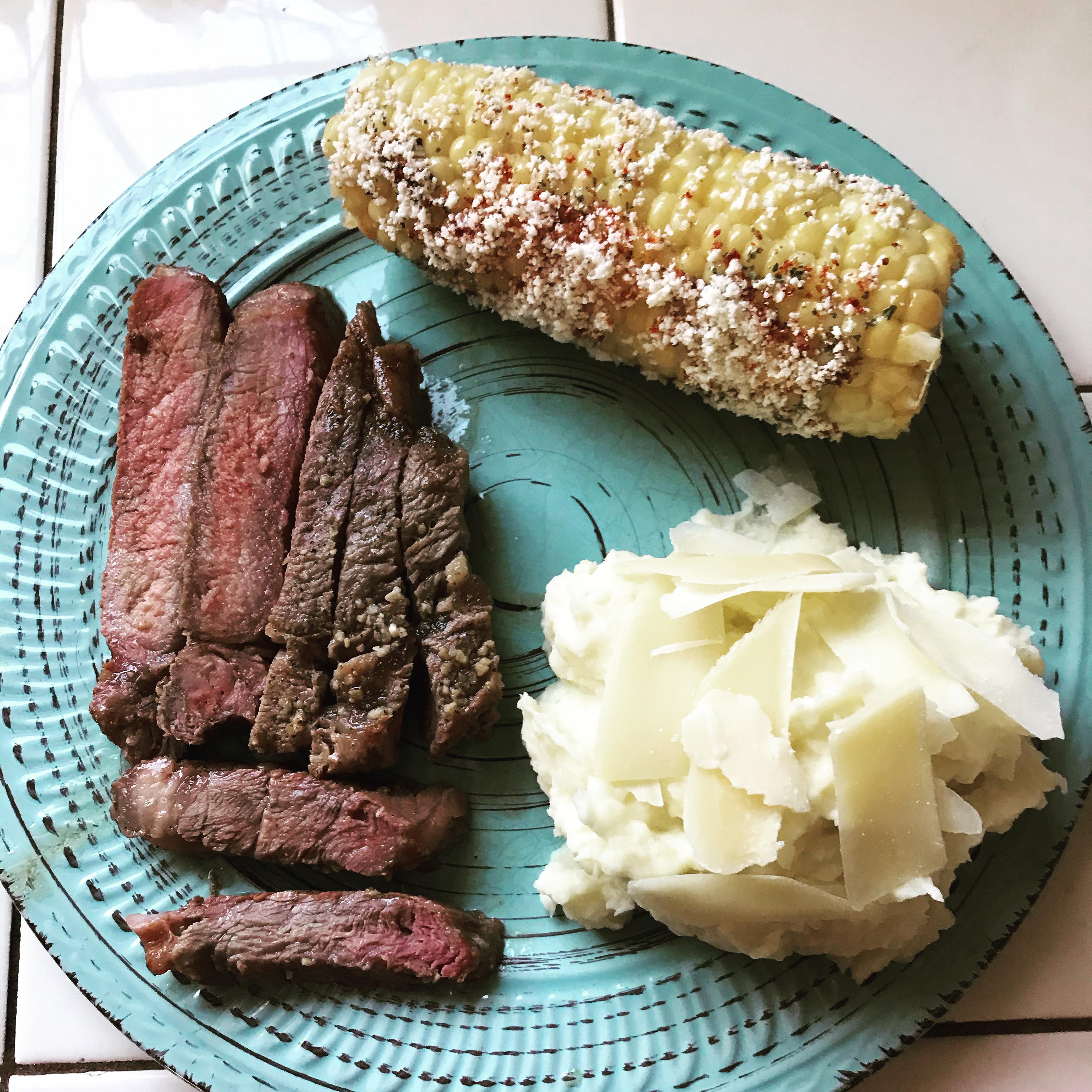 [Homemade] ribeye steak, side of steamed corn on the cob with cotija