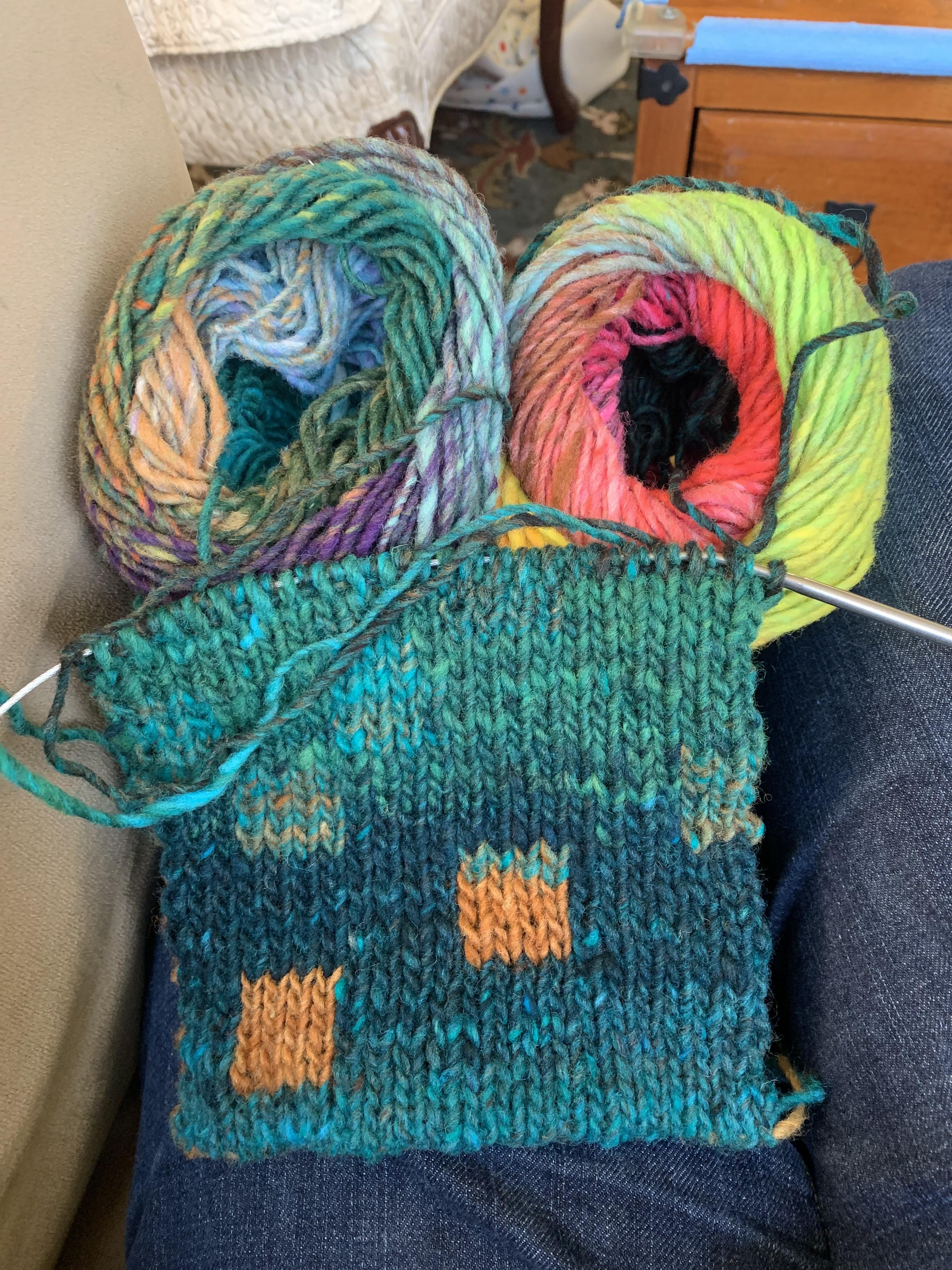 I chose two contrasting yarns for double knitting, and within 30 rows