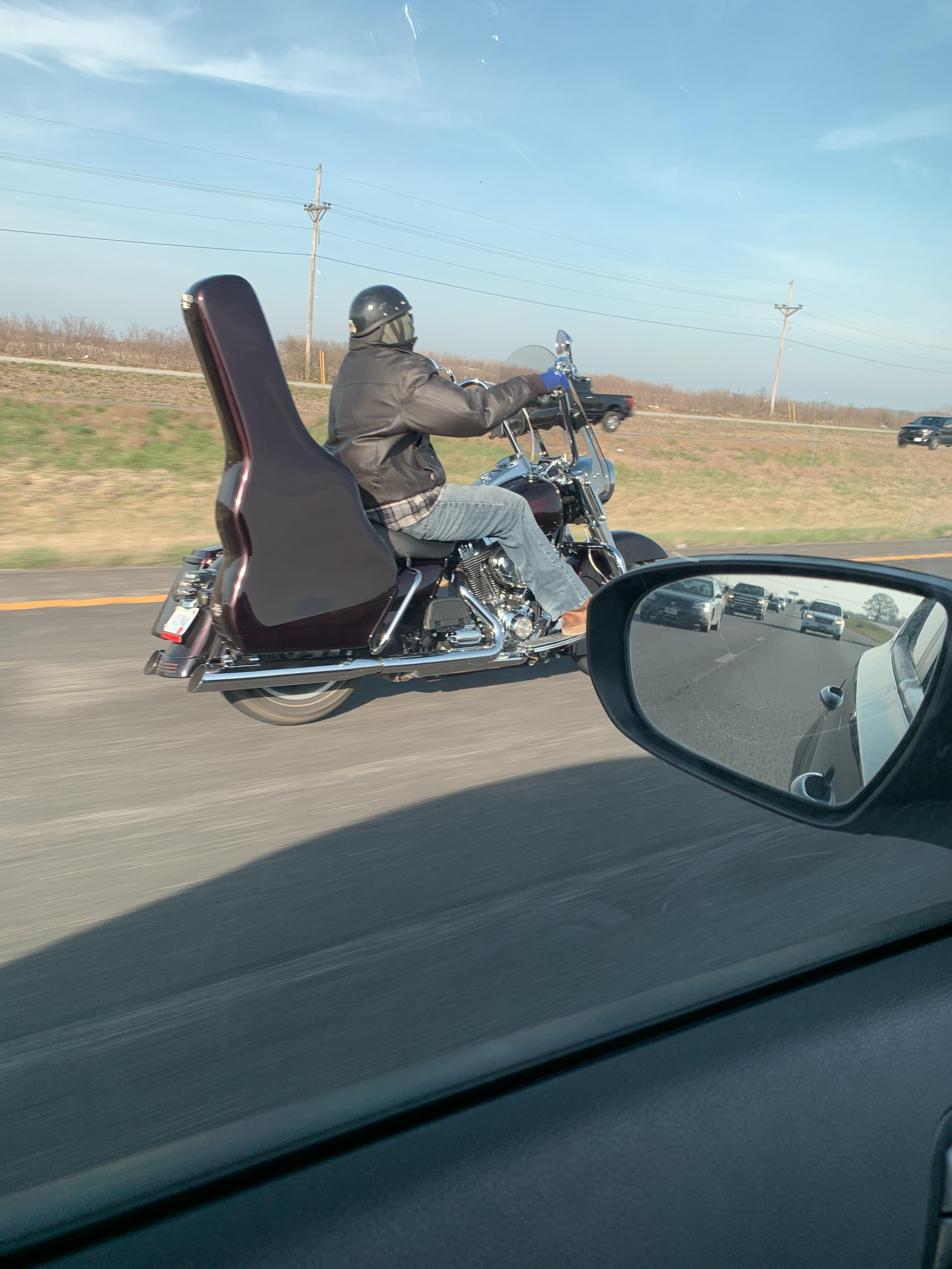Built in motorcycle guitar case saddle bag. r/ATBGE