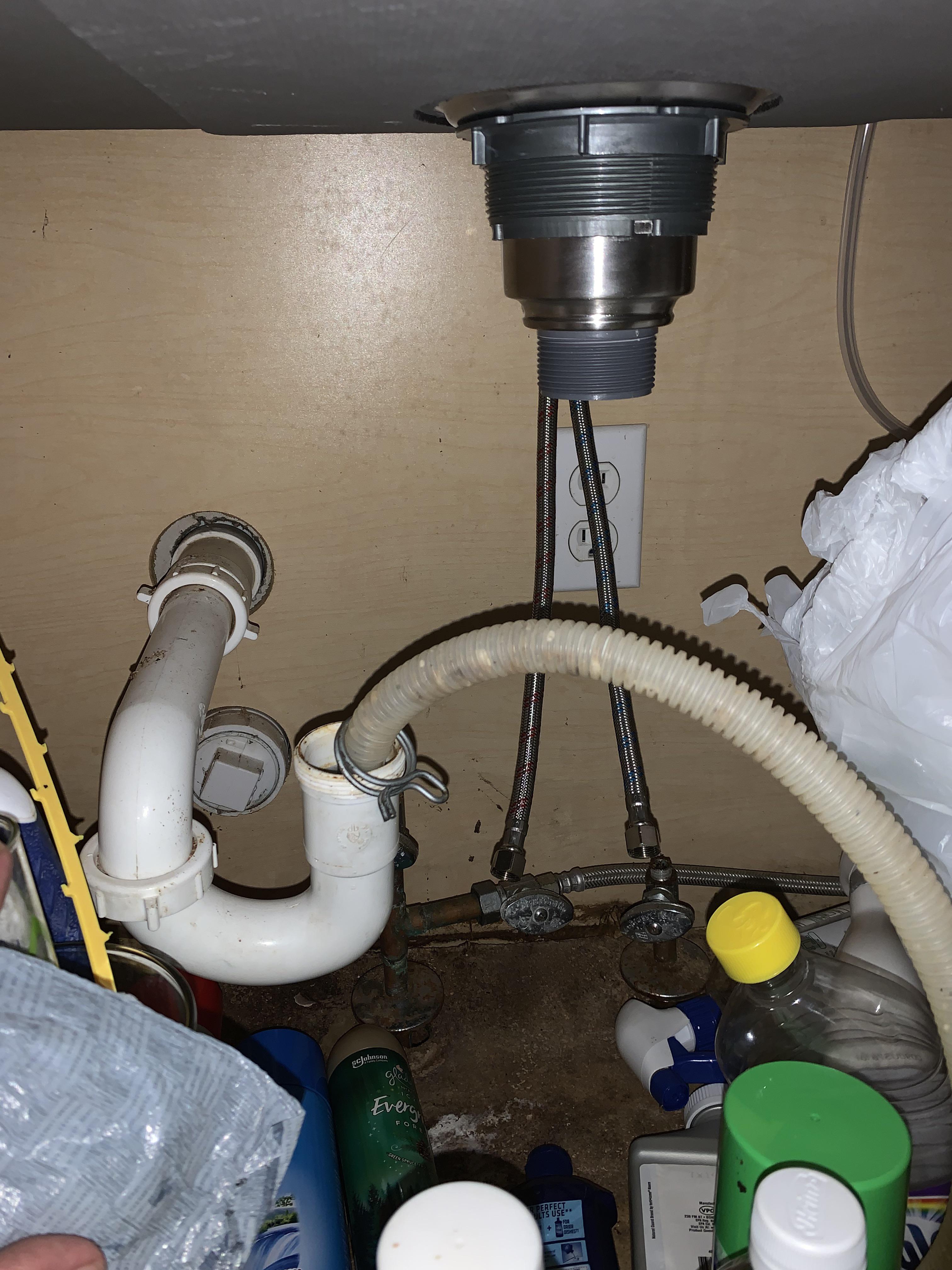 I have my dishwasher drain just sitting in the ptrap right now. I have