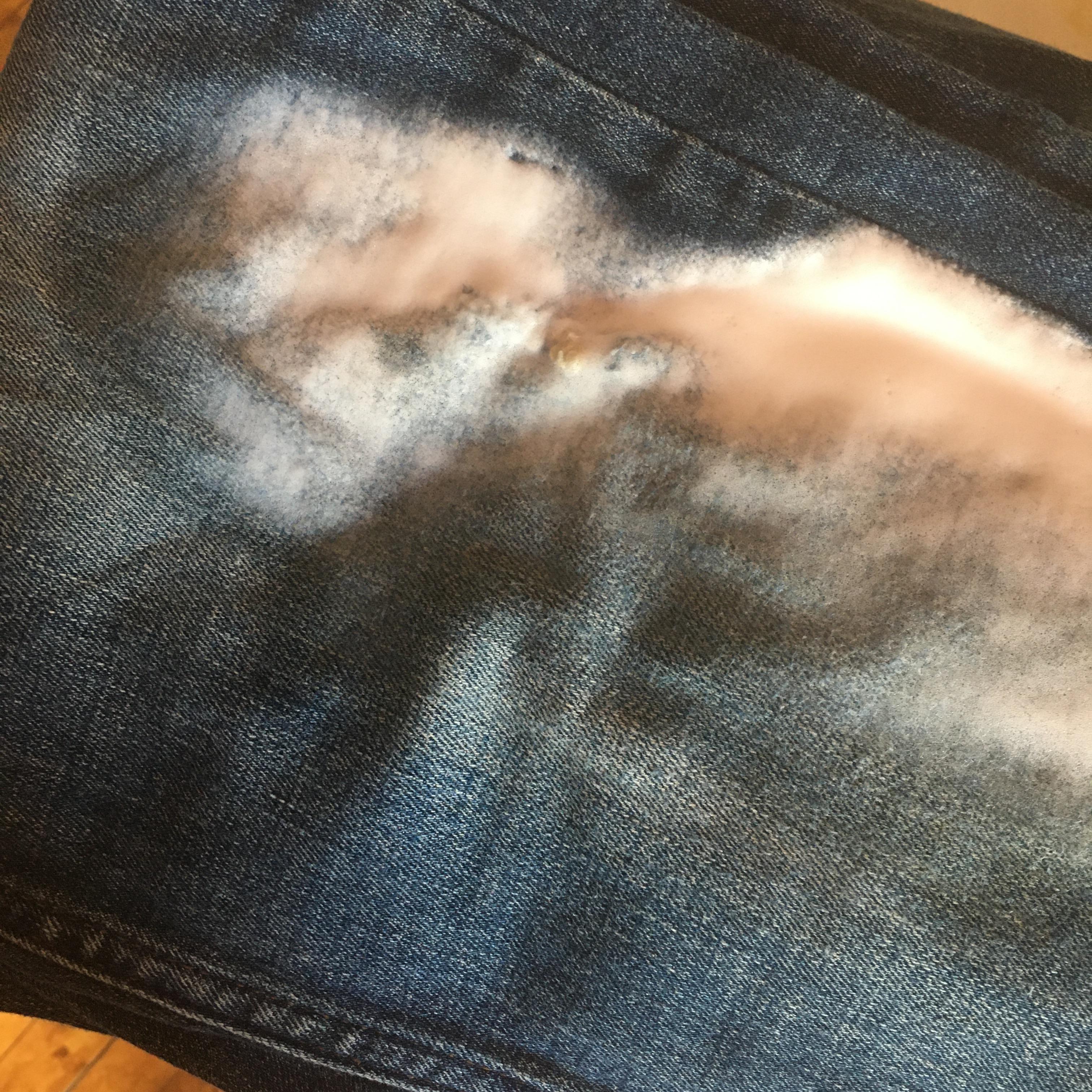 Why would peroxide foam on jeans? I was trying to get a stain out and