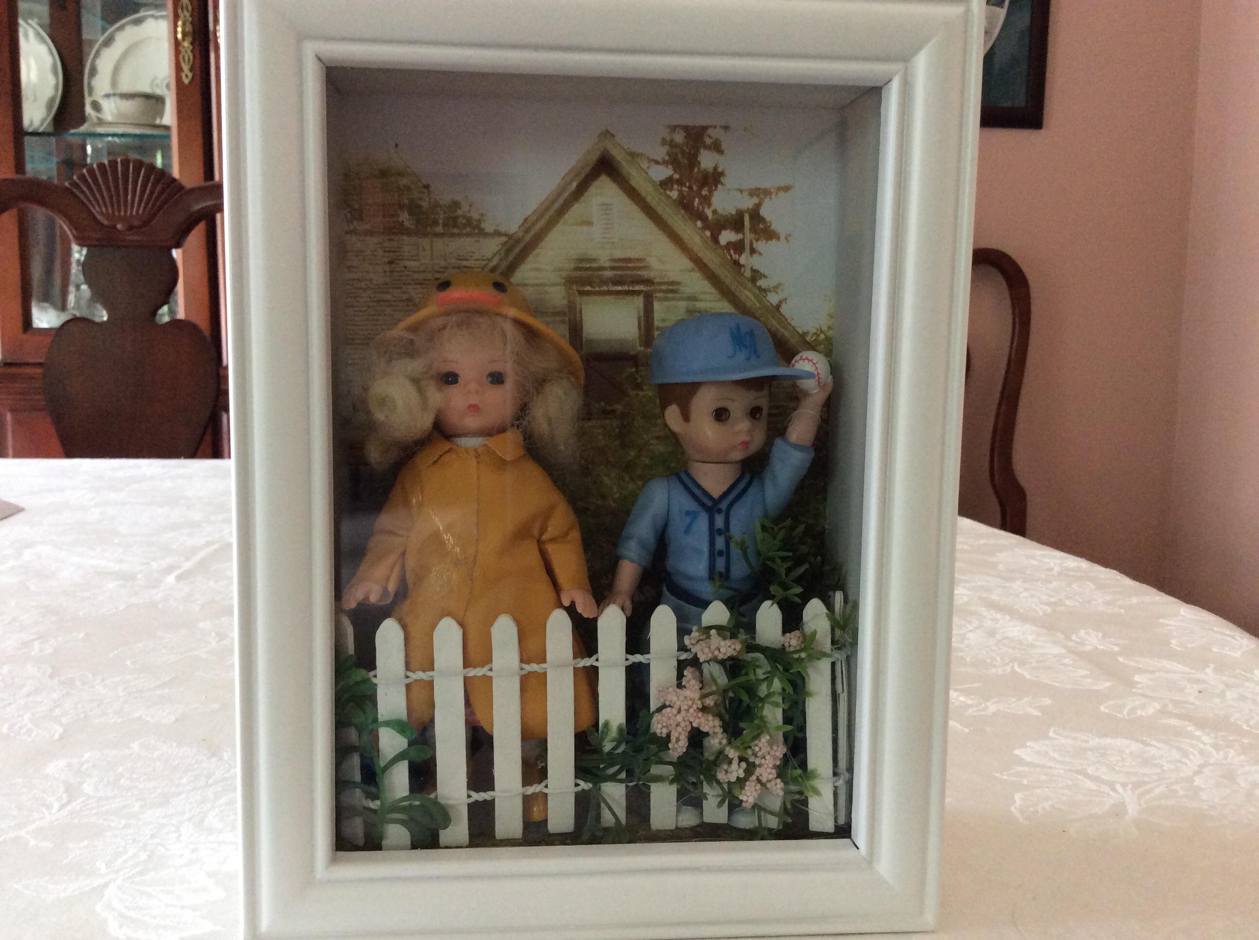 Made a shadow box with thrift store dolls and frame. r/crafts