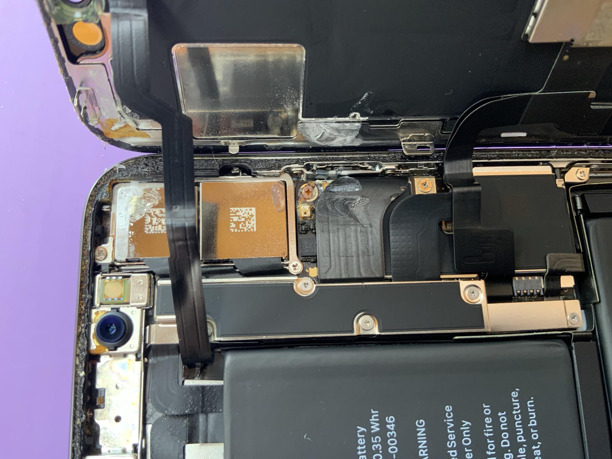 Dropped my iPhone X into the ocean and had water enter on top right