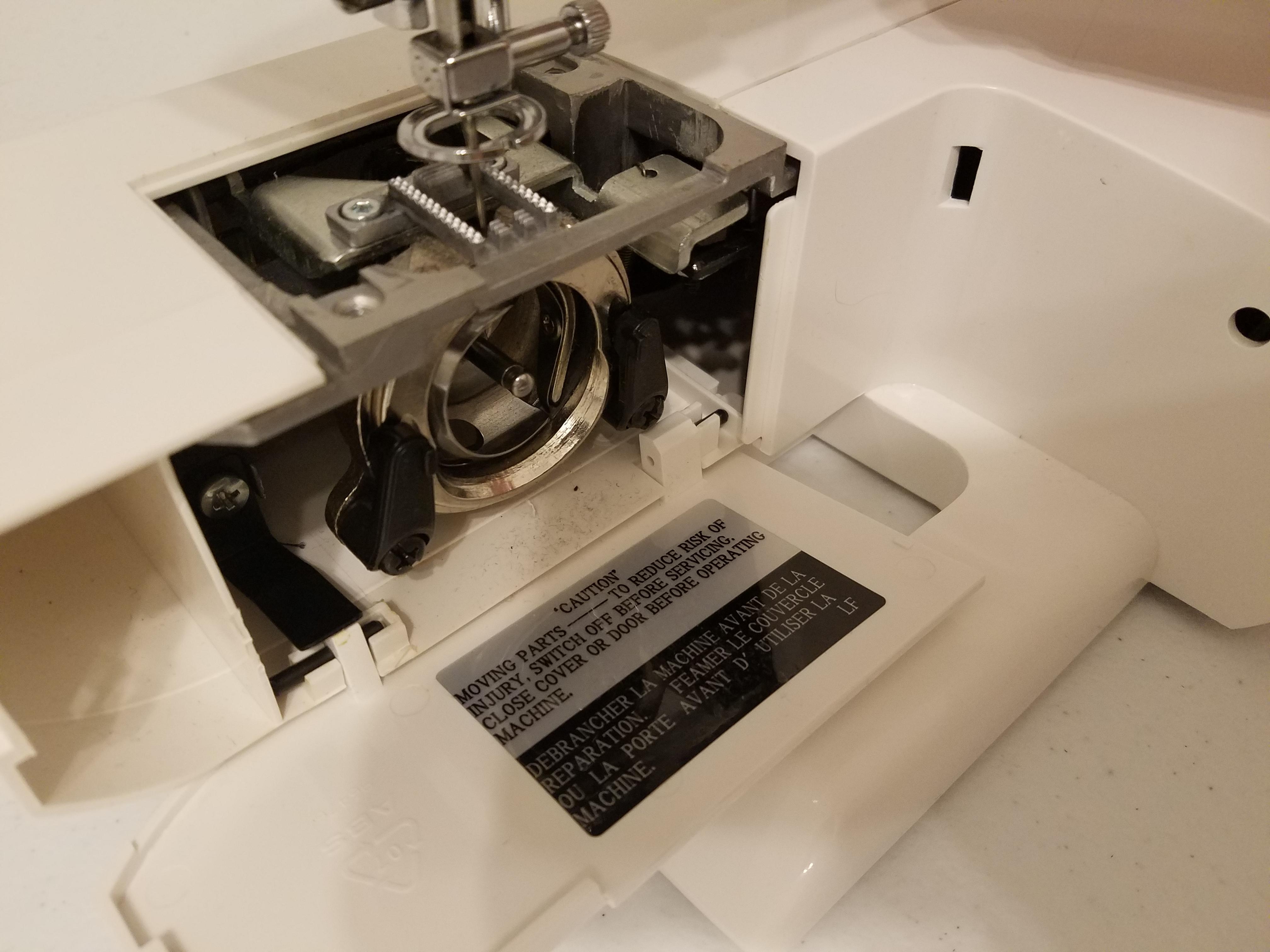 Help! Singer fashion mate can't figure out how to drop the feed dogs