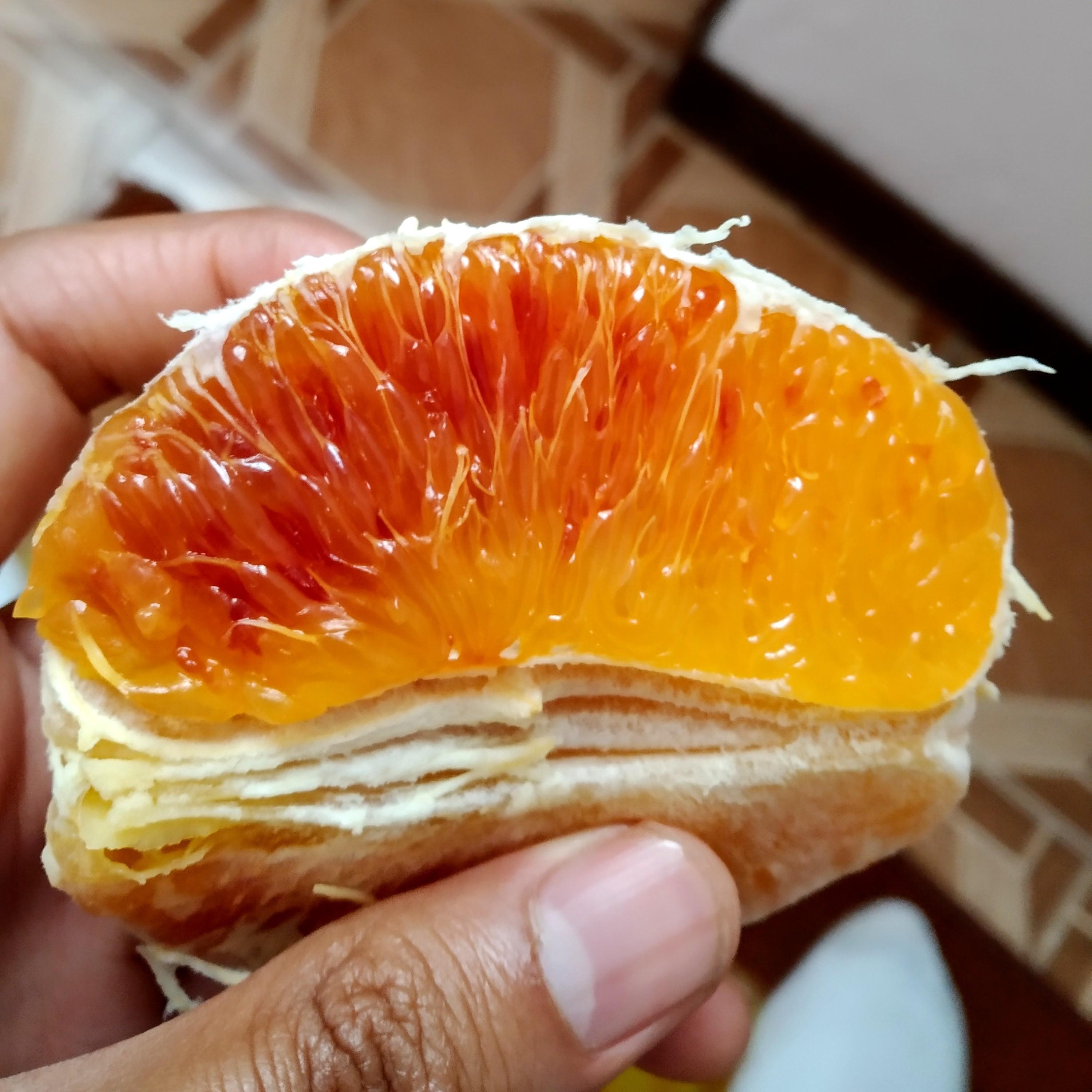 This slice of an orange going bad... r/mildlyinteresting