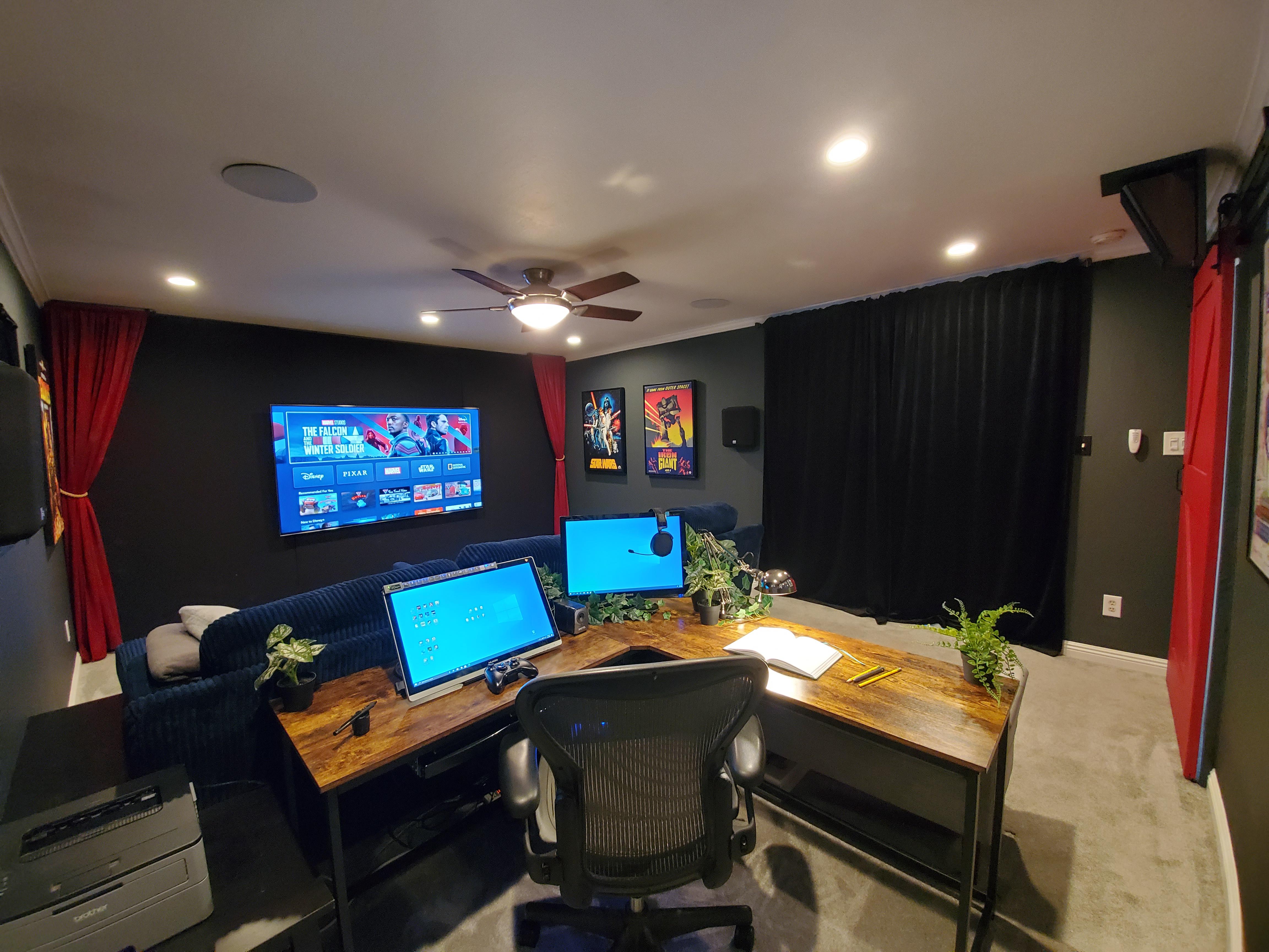 My home office/theater room. PC can connect to the big screen/atmos