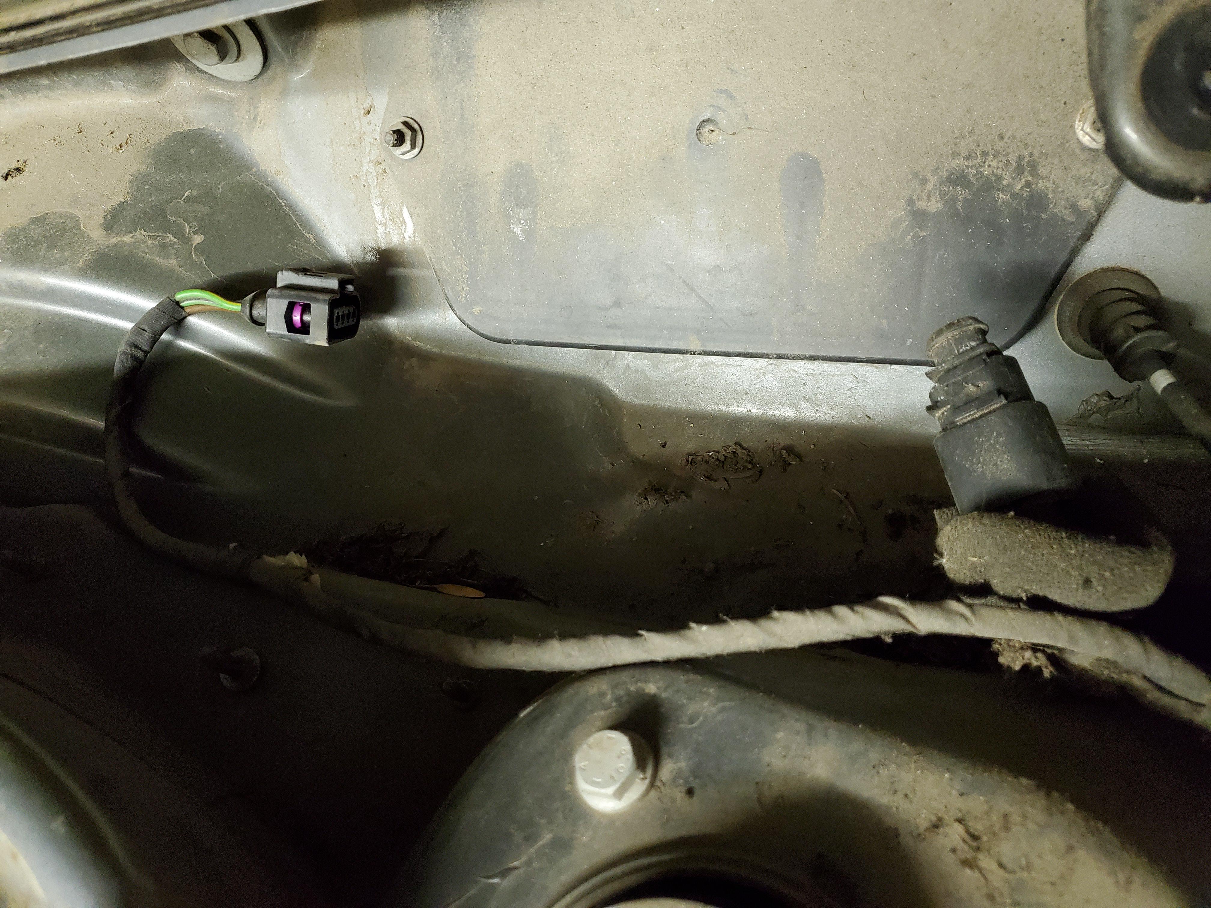 Replacing the wiper motor on 2011 VW Jetta TDI. The plug on the left
