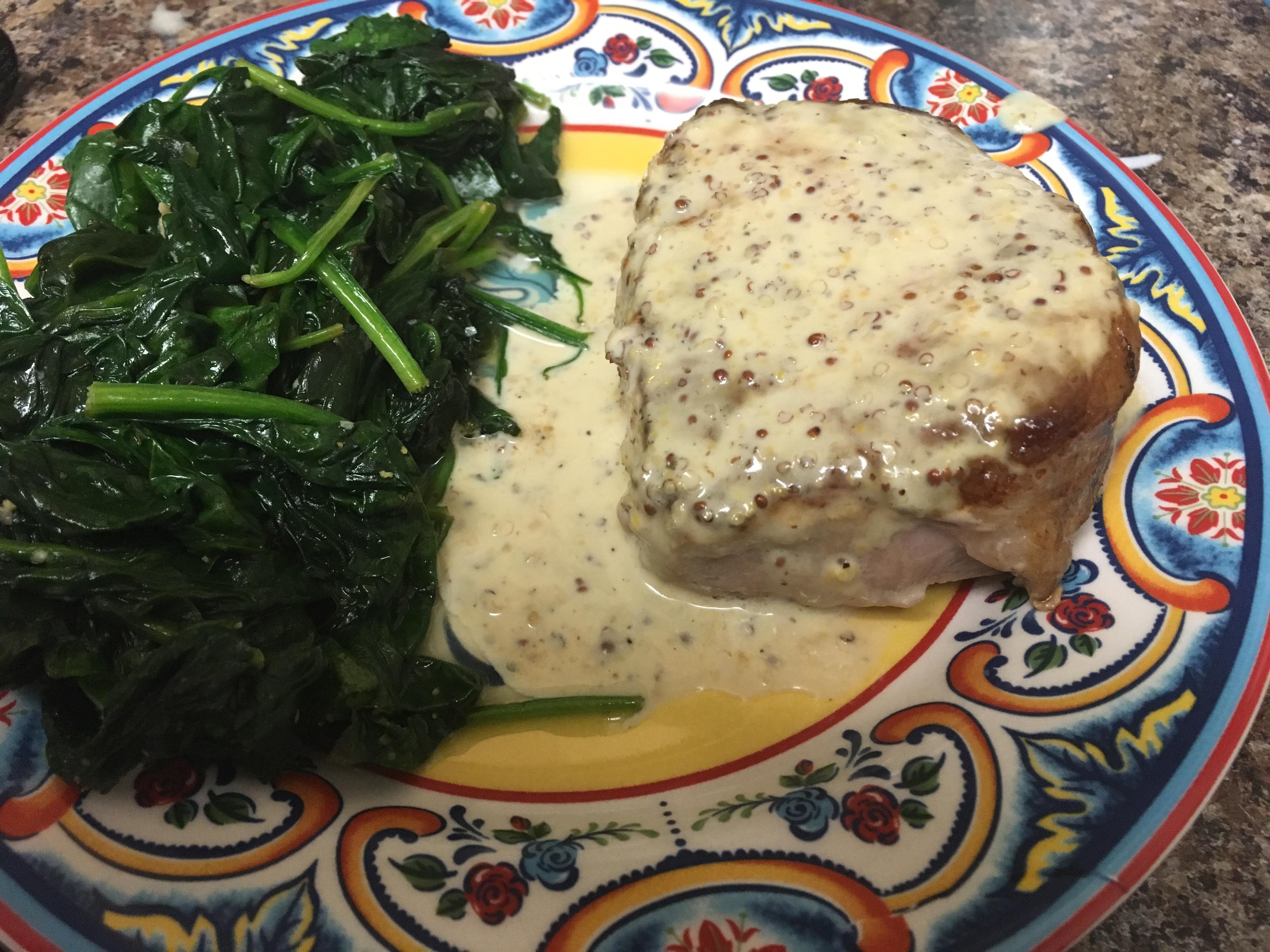Panseated pork chop with mustard cream sauce and sautéed spinach (recipe in comments) r