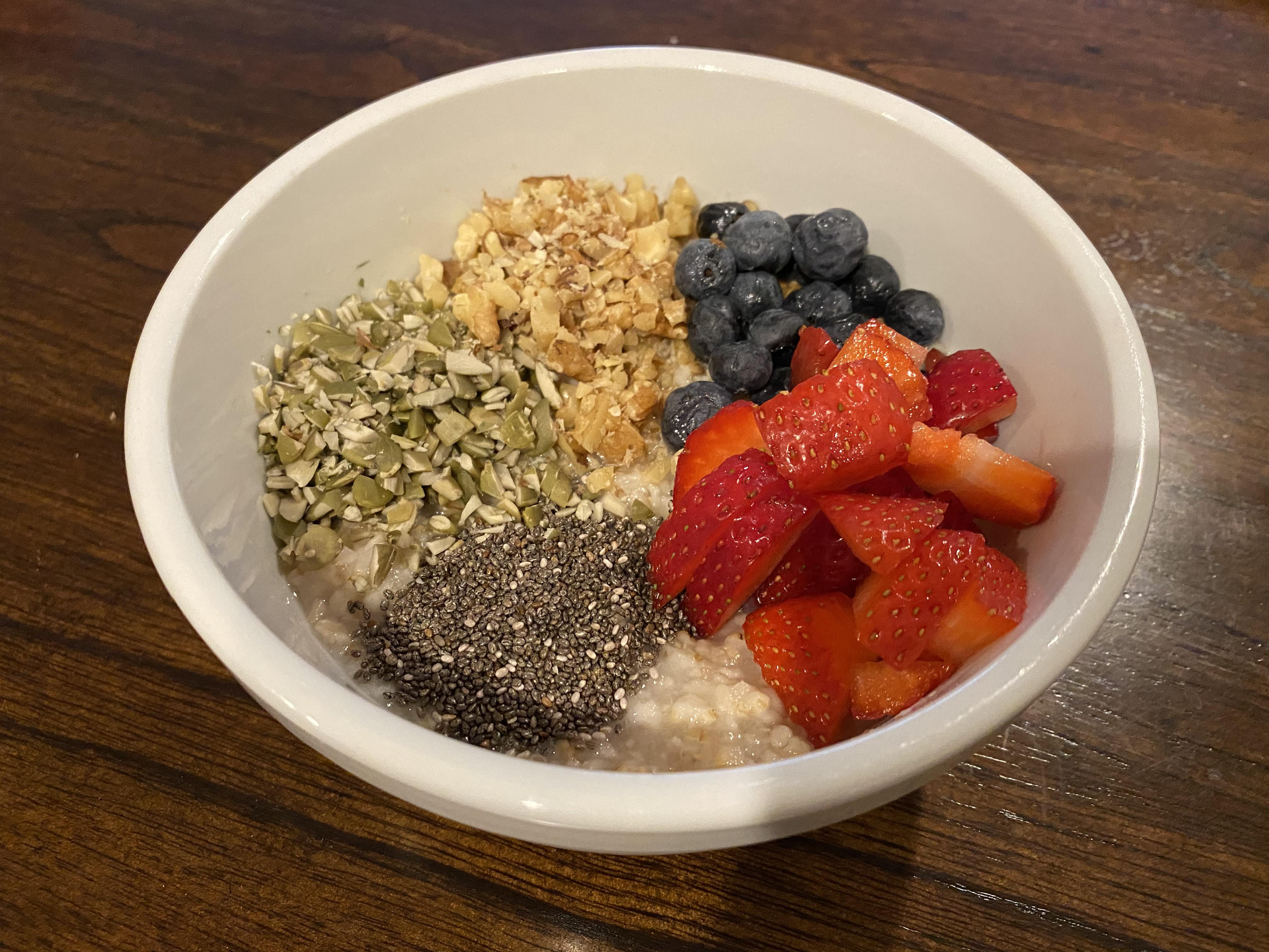 Steel cut oats with chia seeds, pumpkin seeds, walnuts, blueberries