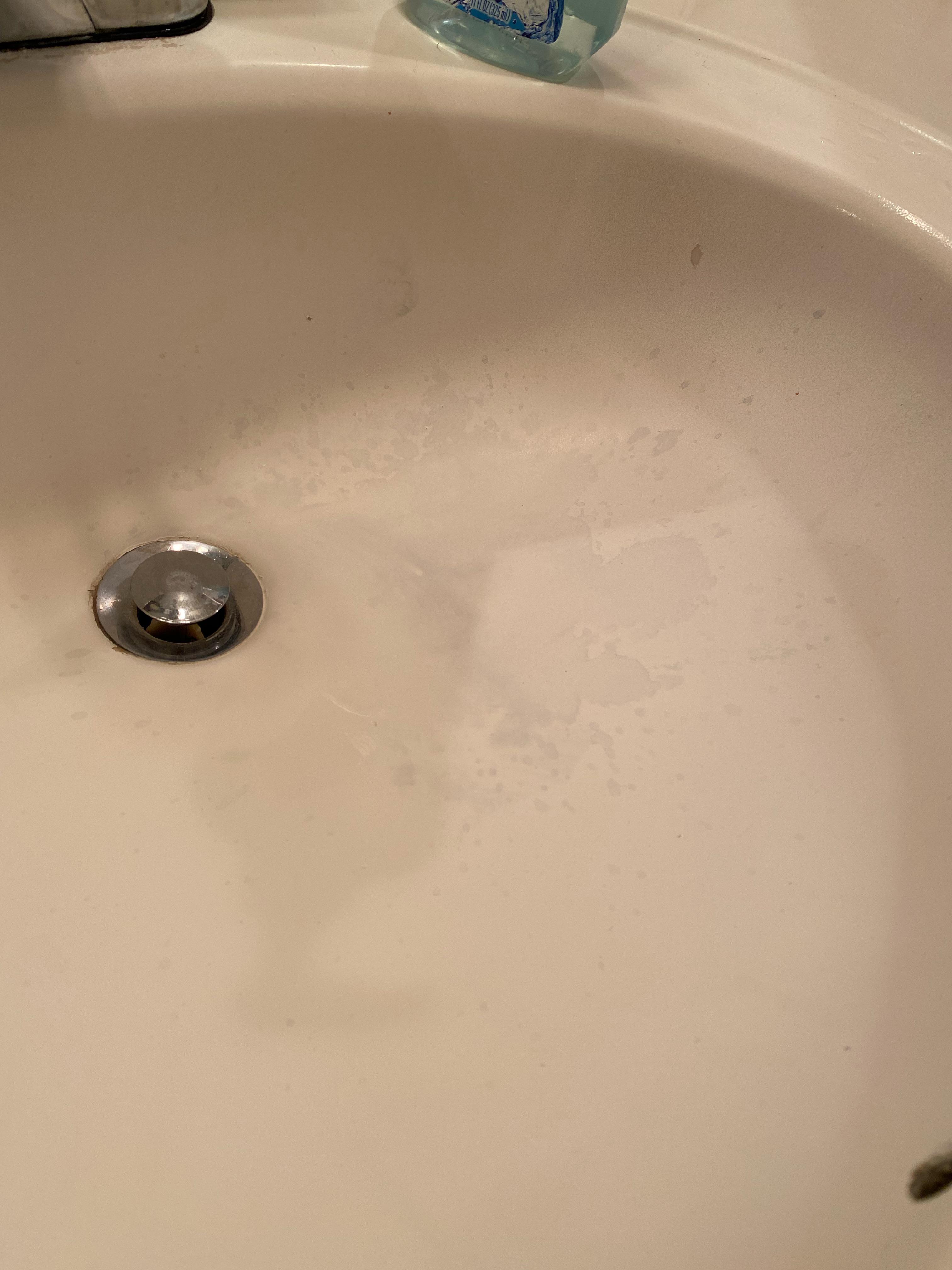 I spilled nail polish remover (100 acetone) in my sink. How do I get