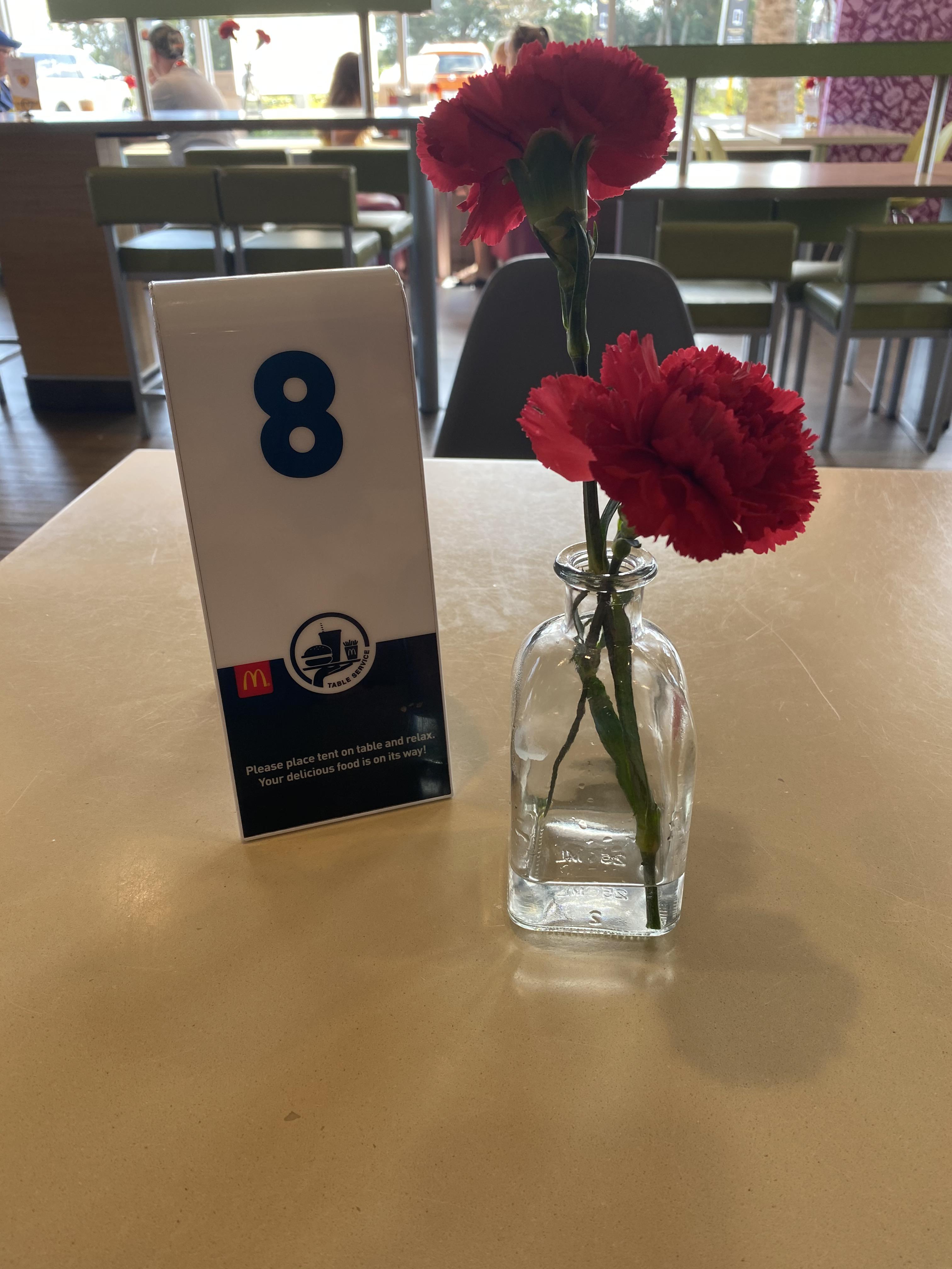 My local McDonald’s put a vase of flowers on my table for sitting in