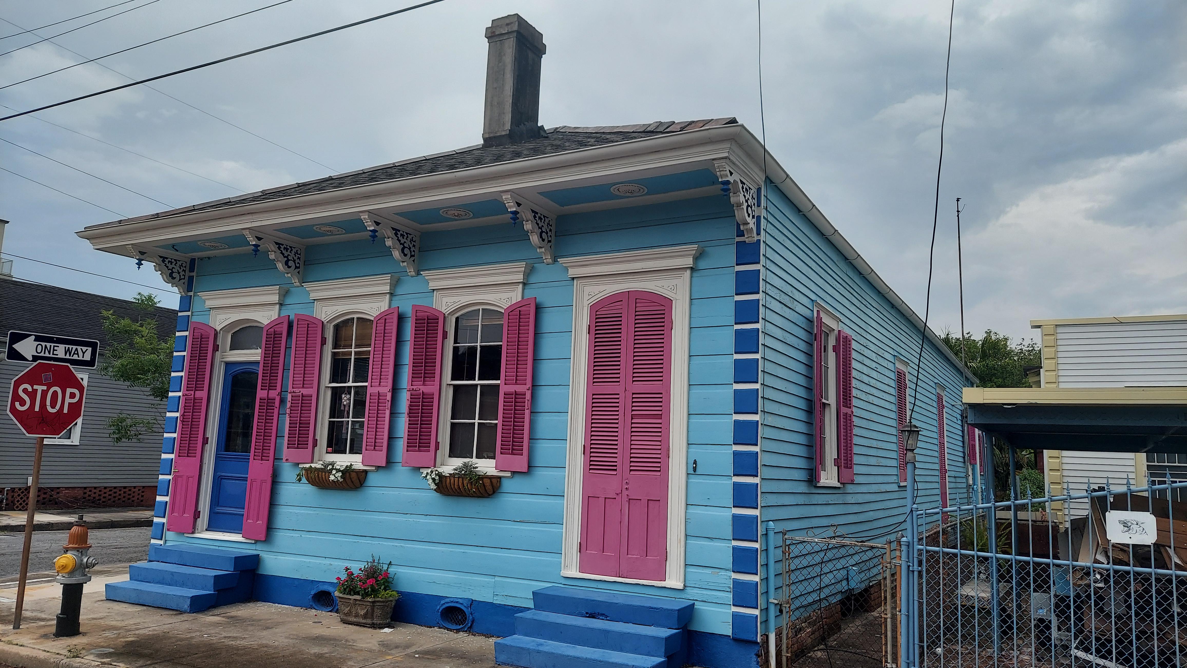 classic double 9th ward New Orleans shotgun with underpinnings and aome