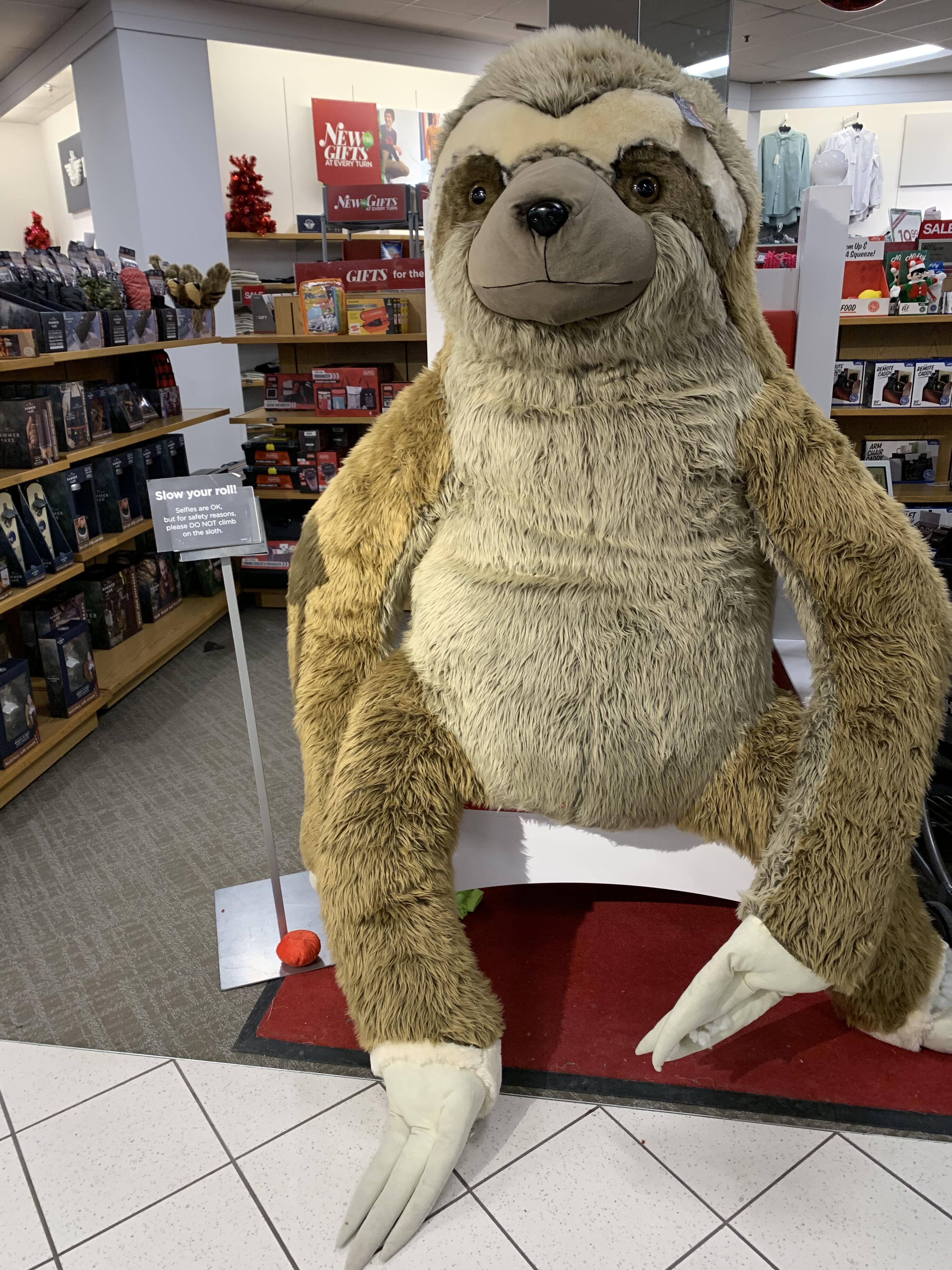 An enormous stuffed sloth at a department store in Minnesota r