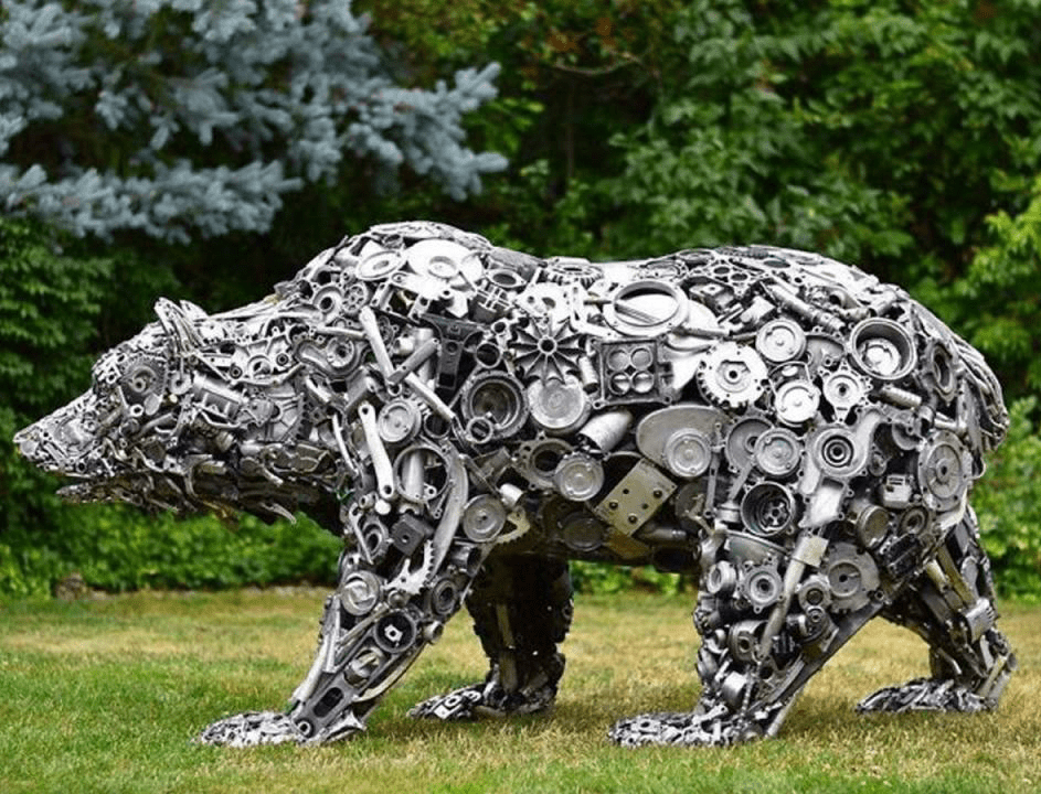 A sculpture of a bear made entirely out of metal scraps ( NOT MINE