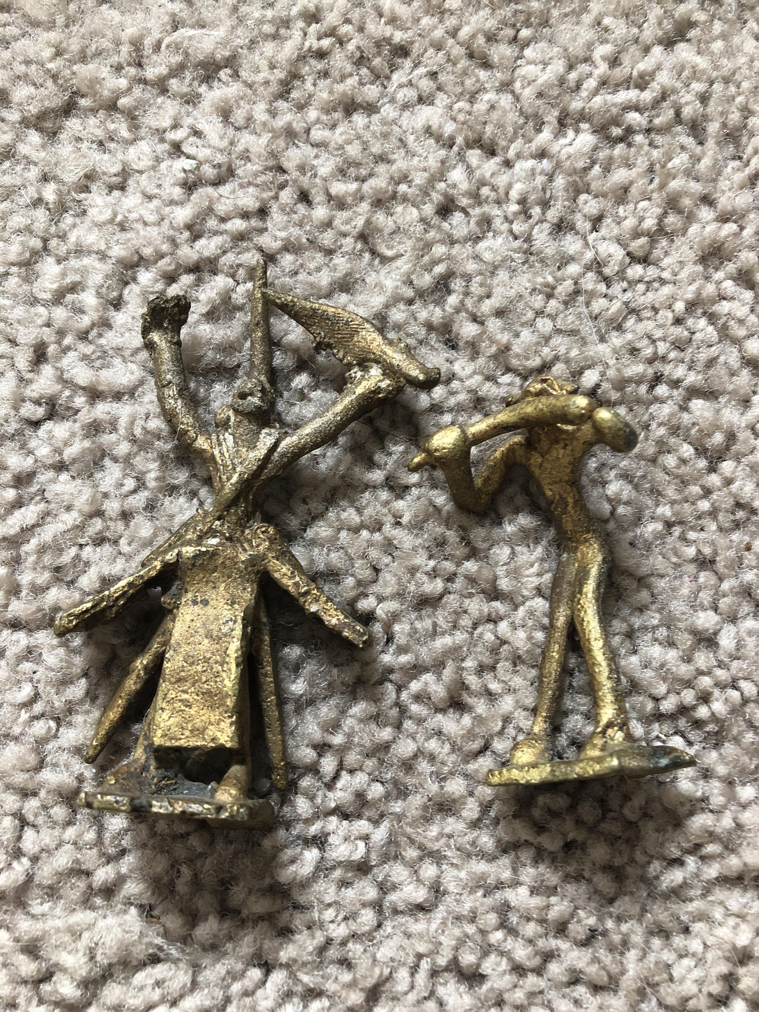 Anyone know what these are? They are small metal figurines but I have