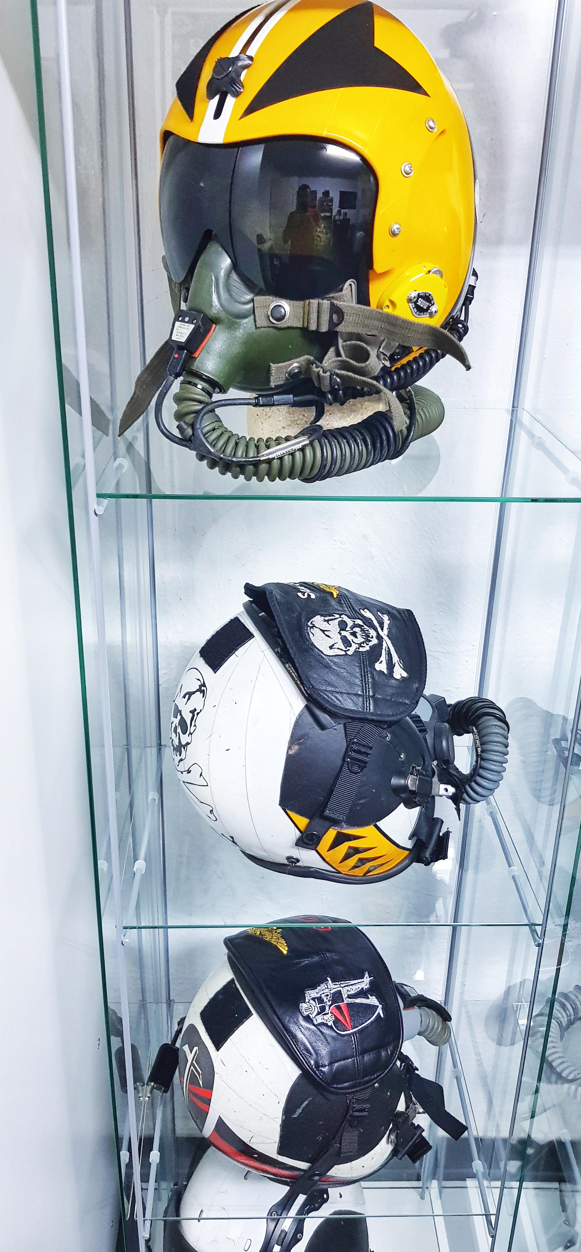 Some of my USN flight helmets, the VF84 at the top is a reproduction