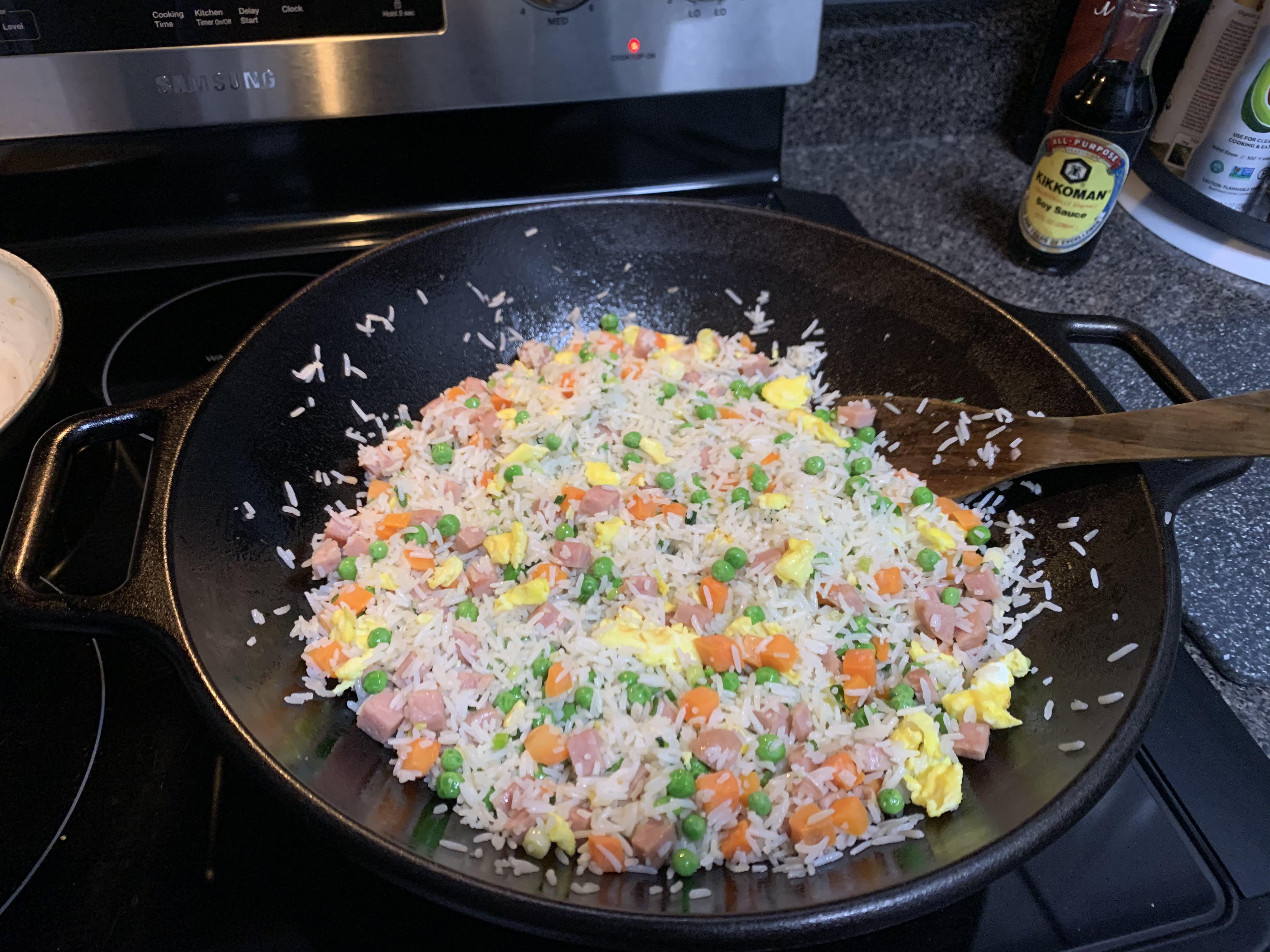 Love making spam fried rice in my cast iron wok! r/castiron