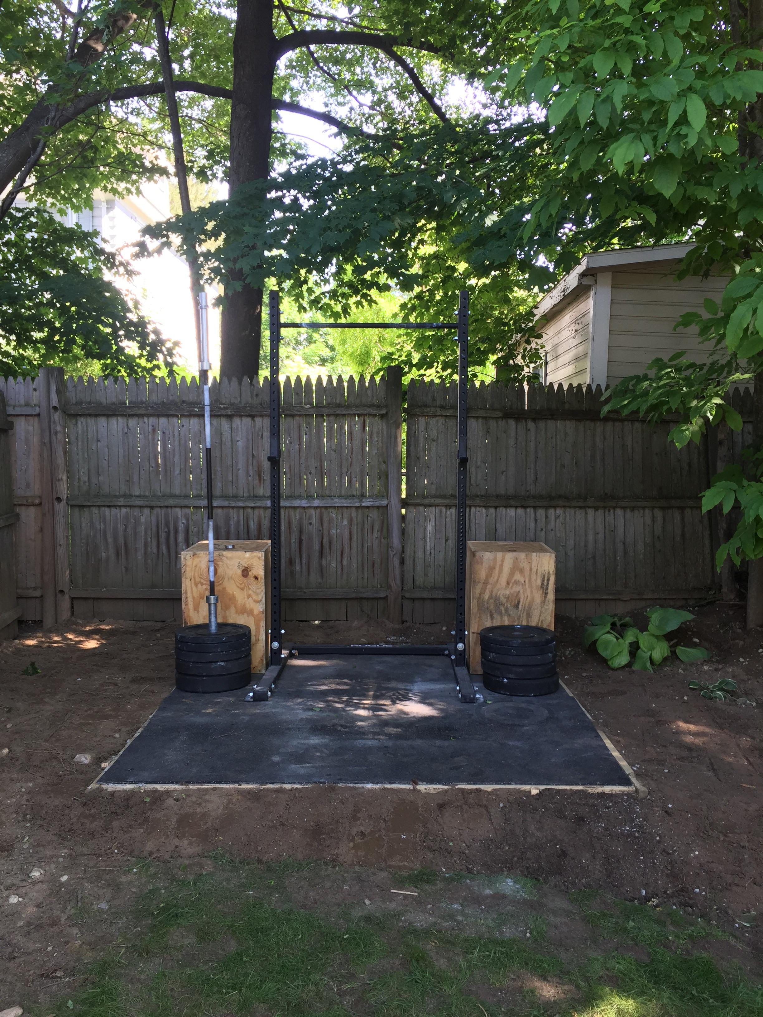Poured an 8x8 cement slab and brought the home gym outside. r/homegym