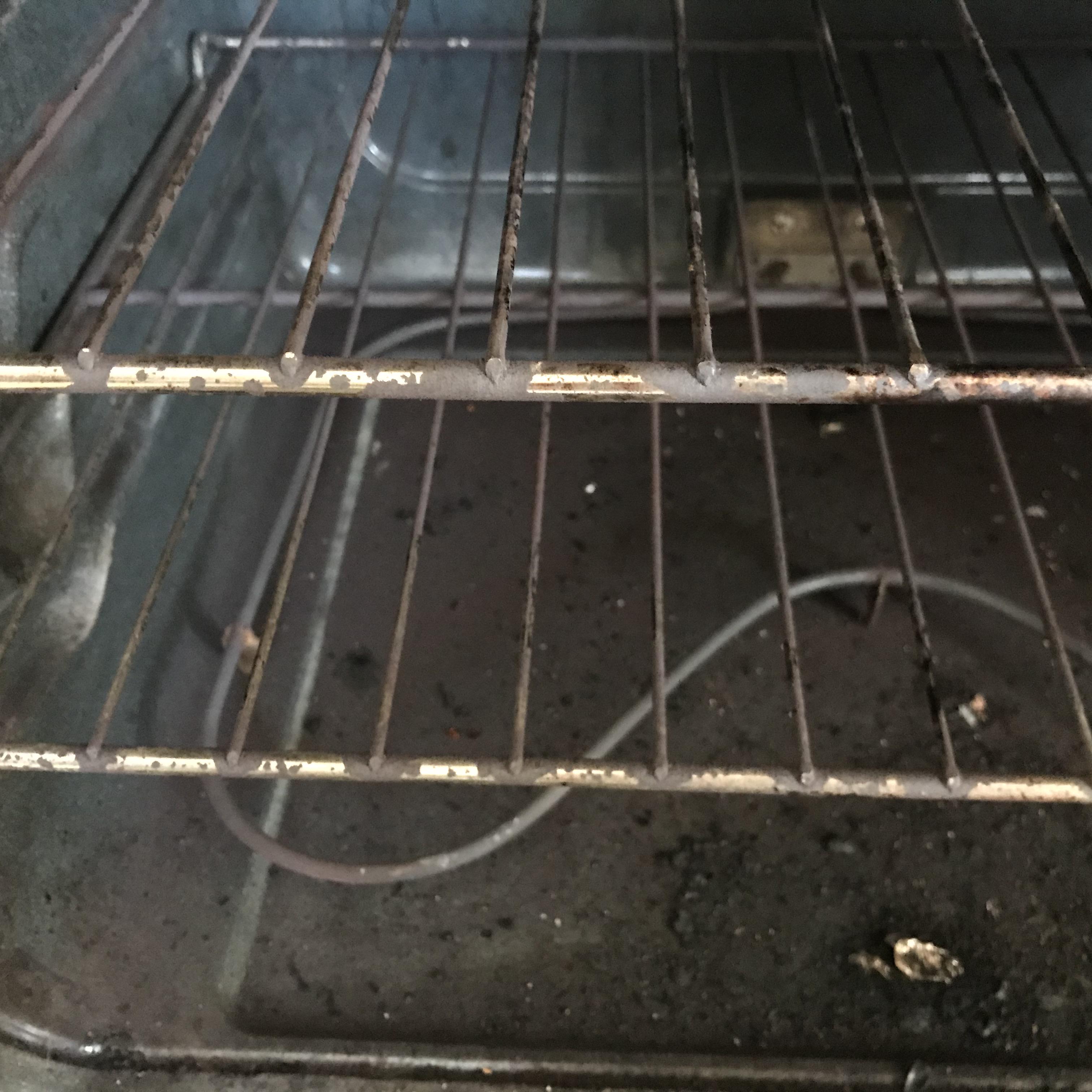 Cleaning this oven. Is this corrosion on the racks, or do you think it will degrease, using the