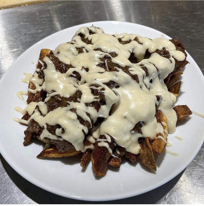 Debris Fries. Hand cut fries with roast beef debris topped with a mornay sauce. r/cajunfood