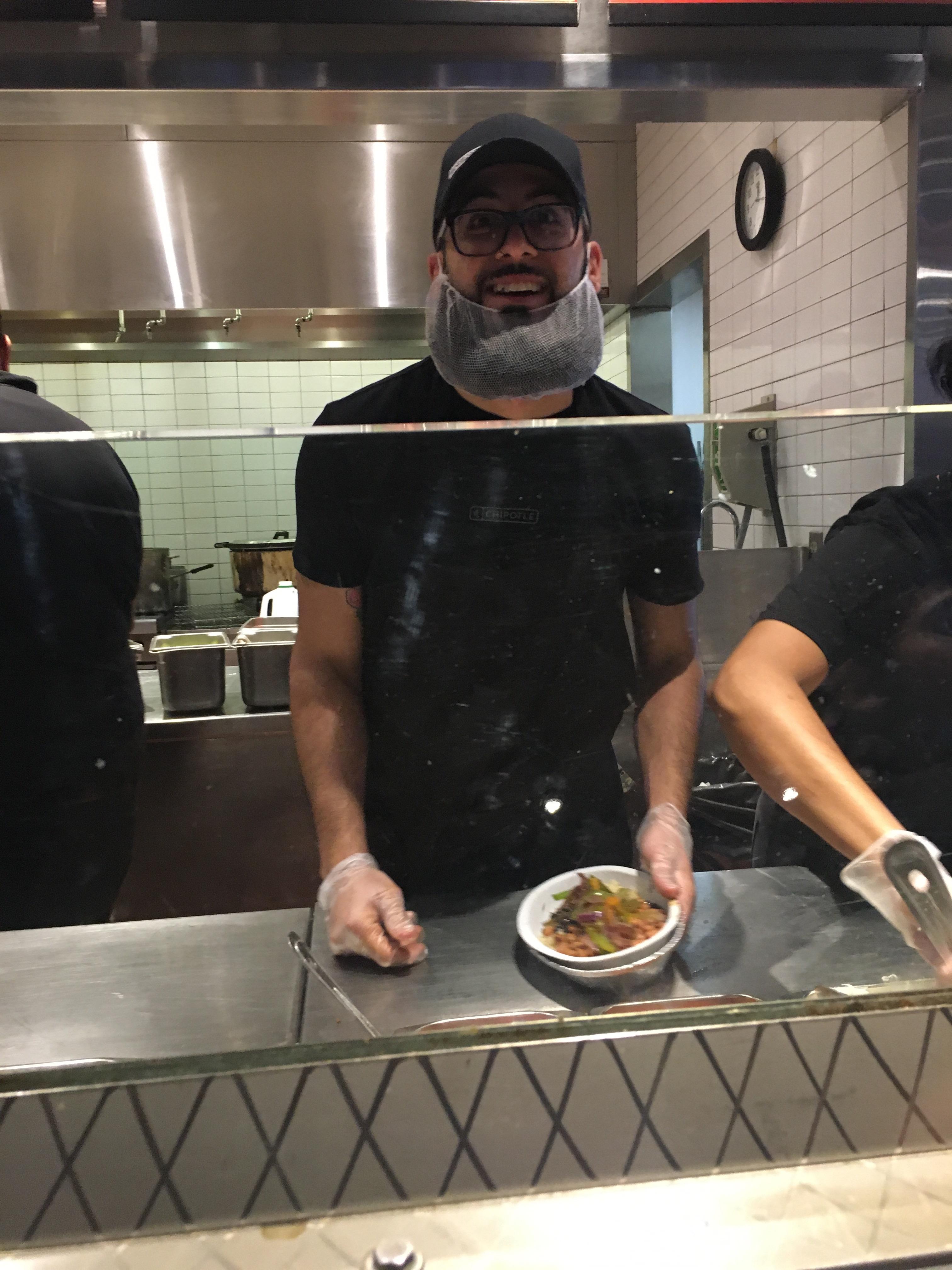 This fast food worker had a hair net for his beard r/mildlyinteresting