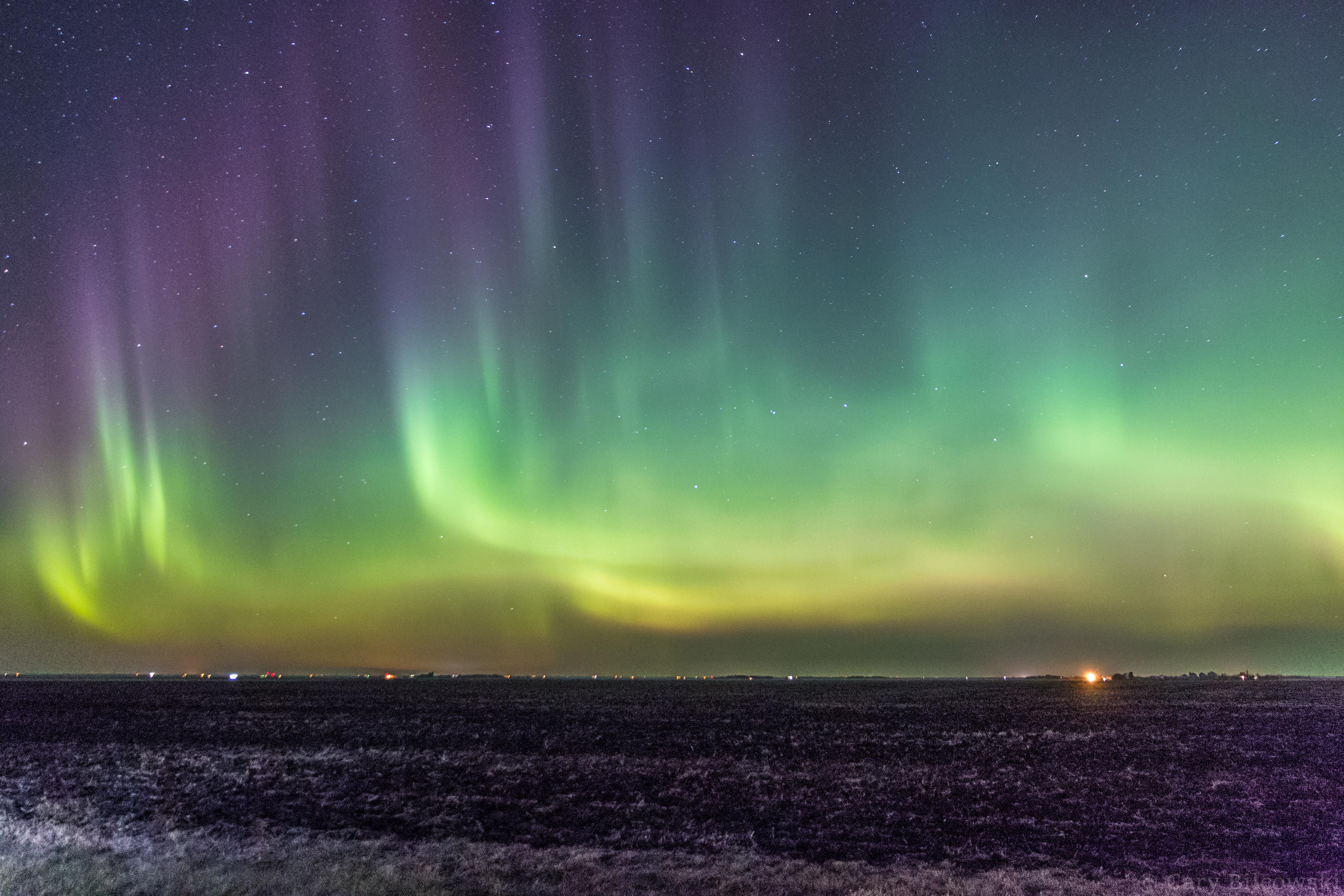 Aurora over a freshly harvested field. 10 minutes North of Winnipeg, MB