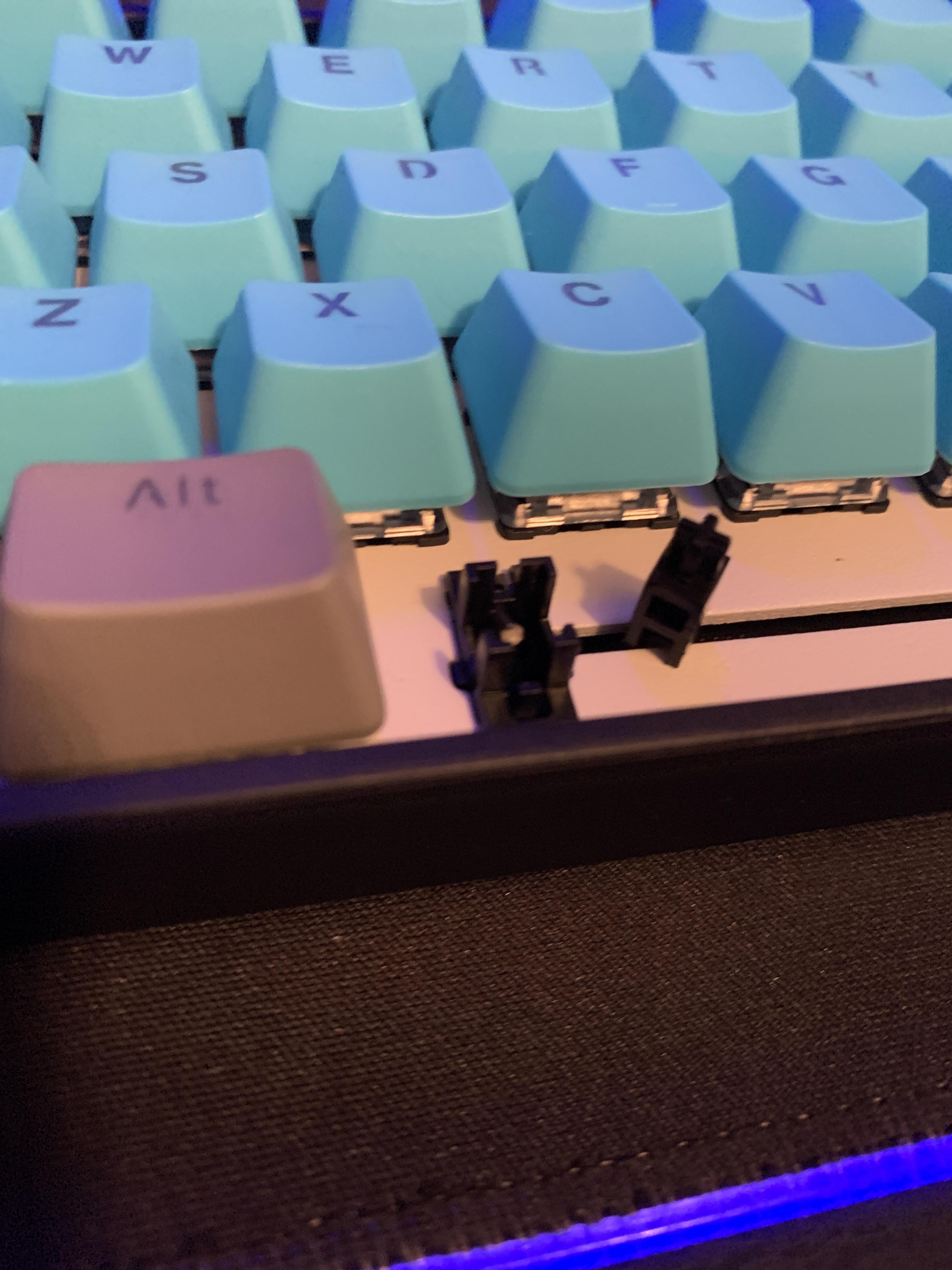 How do I fix the stem back onto the wire of my spacebar? r